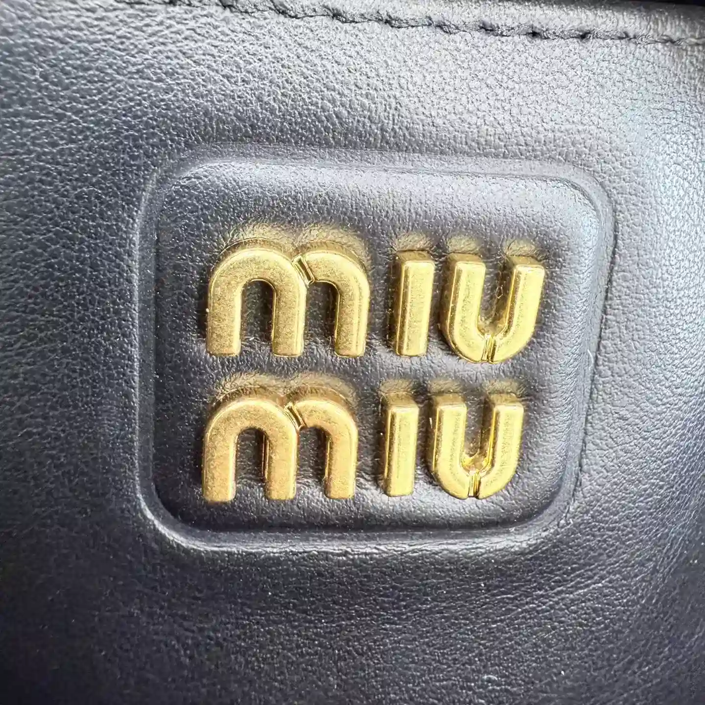 Miu Miu Matelasse Black Calfskin Top Handle Bag product photo from LabelPicks