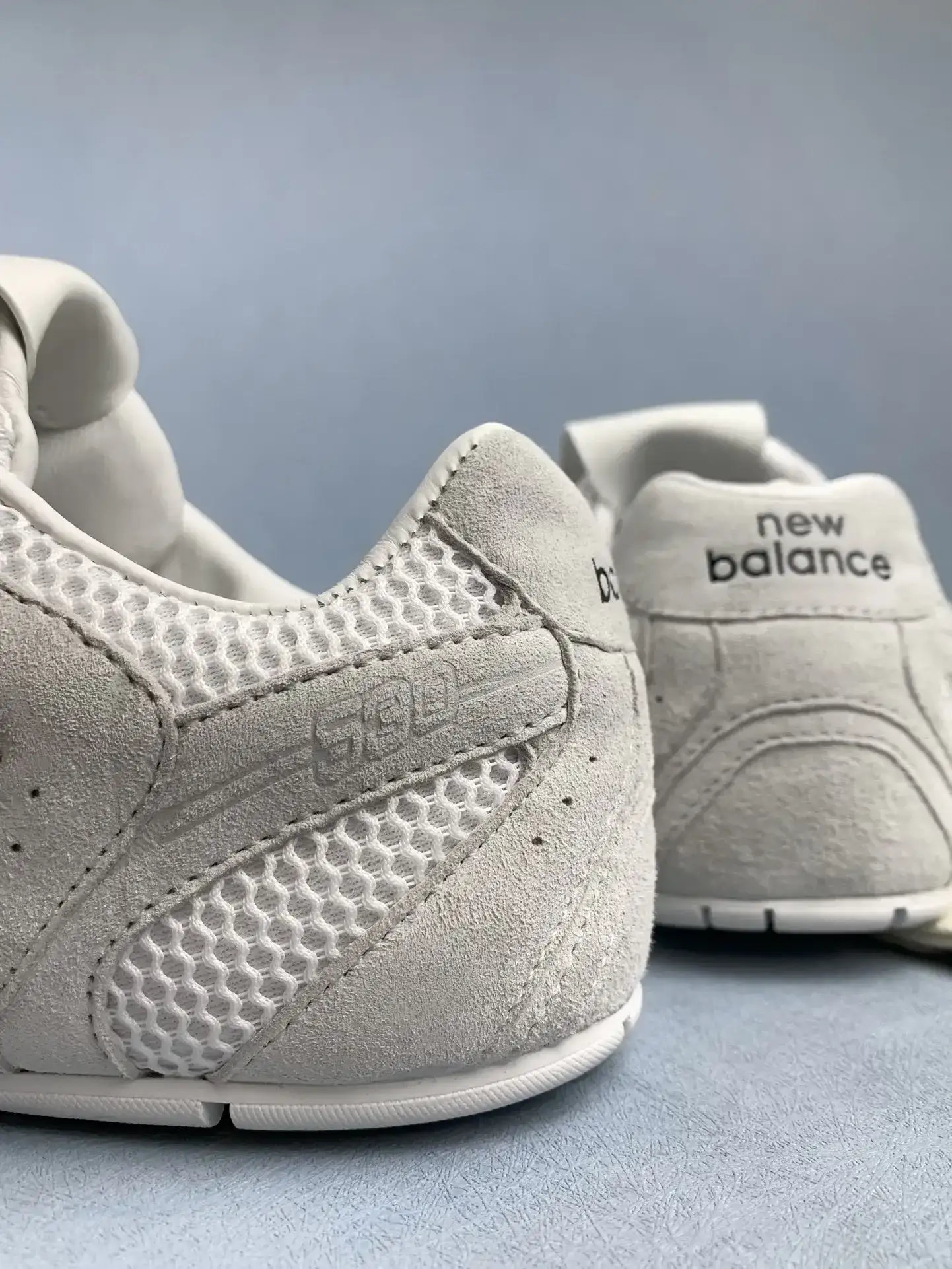 New Balance X Miu Miu 530 suede and mesh sneakers product photo from LabelPicks