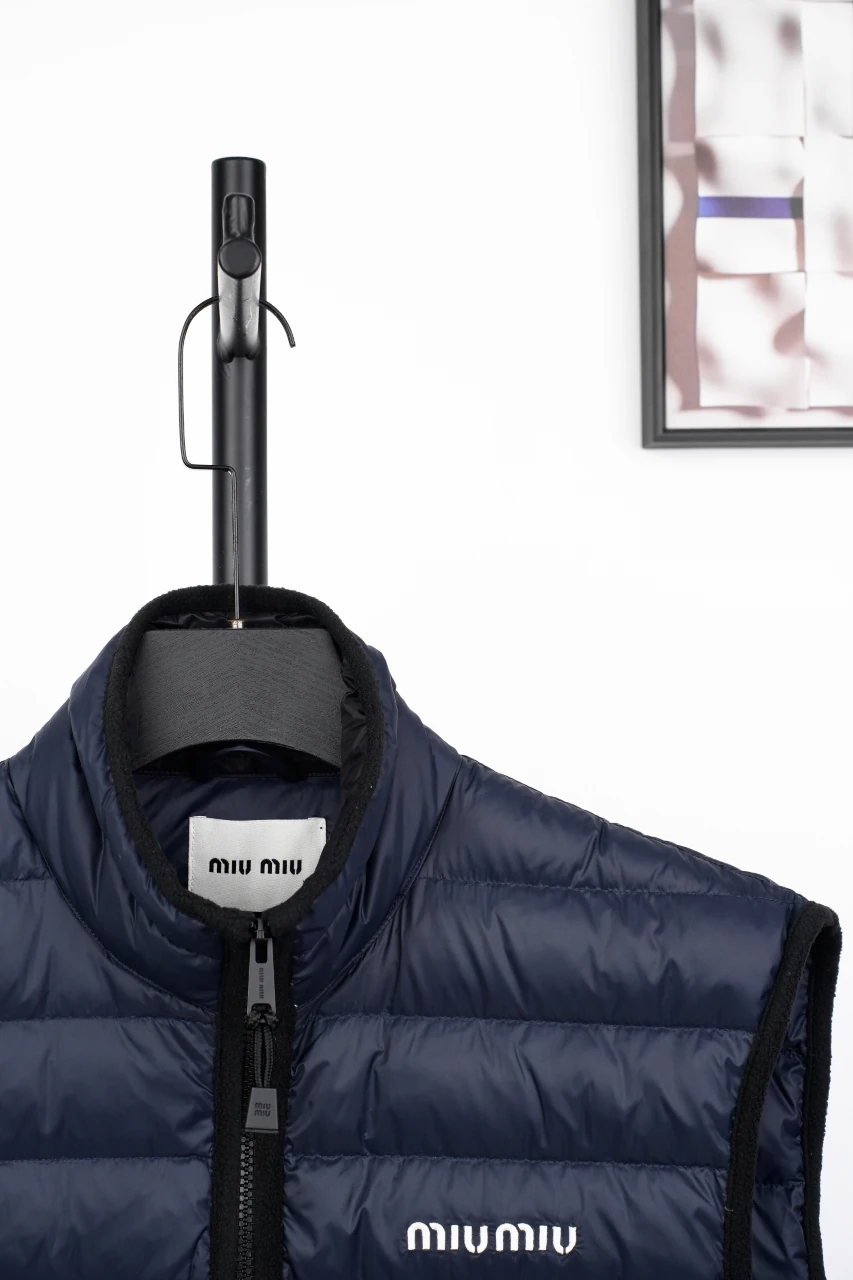 Miu Miu Navy Logo Quilted Down Vest product photo from LabelPicks