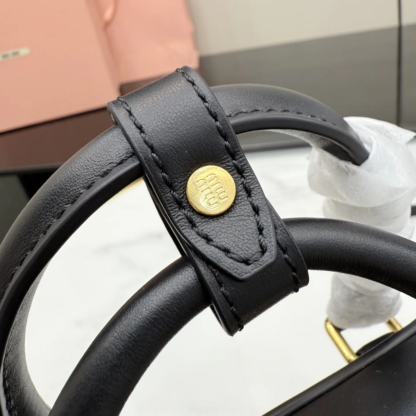 Miu Miu Matelasse Black Calfskin Top Handle Bag product photo from LabelPicks