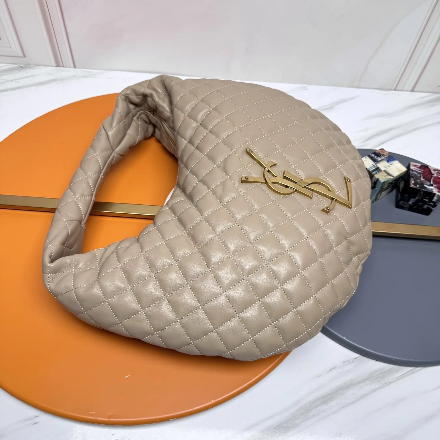 Saint Laurent Icare Beige Lambskin Hobo Bag product photo from LabelPicks