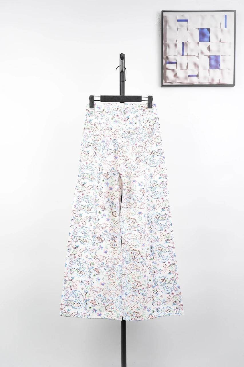 CHANEL Cream White Graffiti Straight-Leg Jeans product photo from LabelPicks