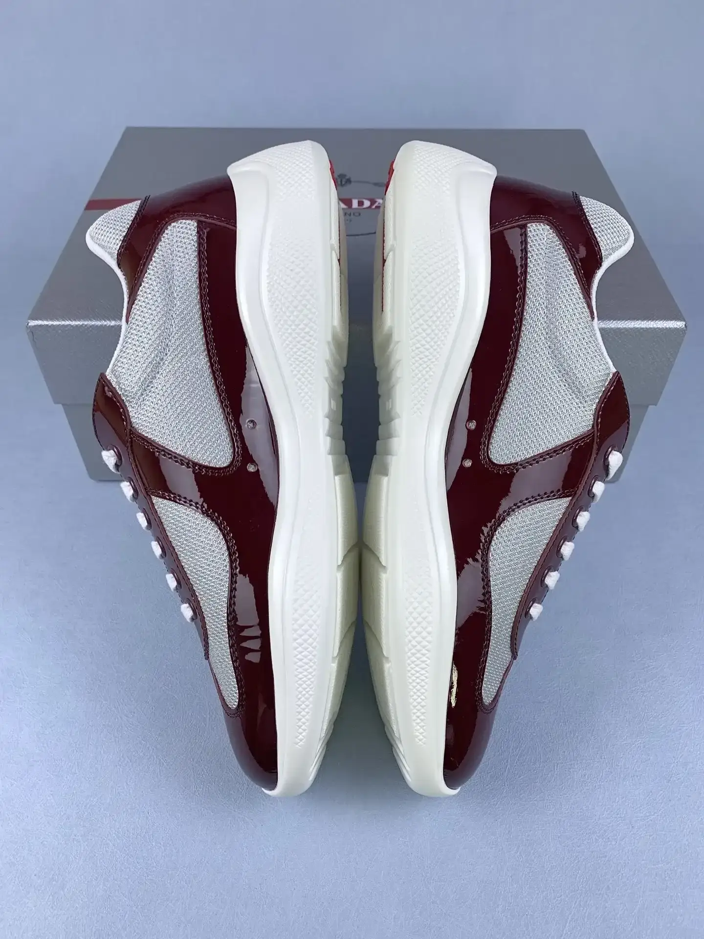 Patent leather and technical fabric Prada America's Cup sneakers product photo from LabelPicks