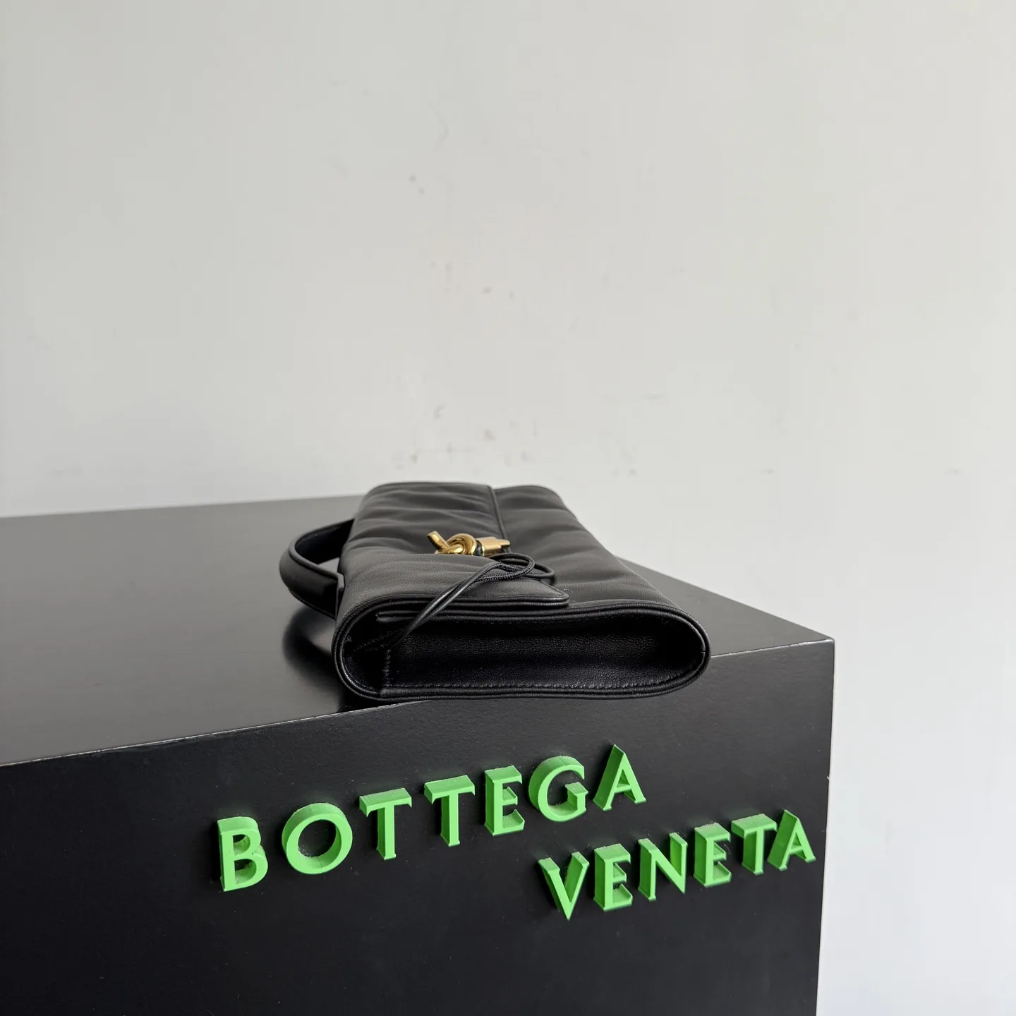 Bottega Veneta Andiamo Intrecciato Woven Leather Clutch product photo from LabelPicks