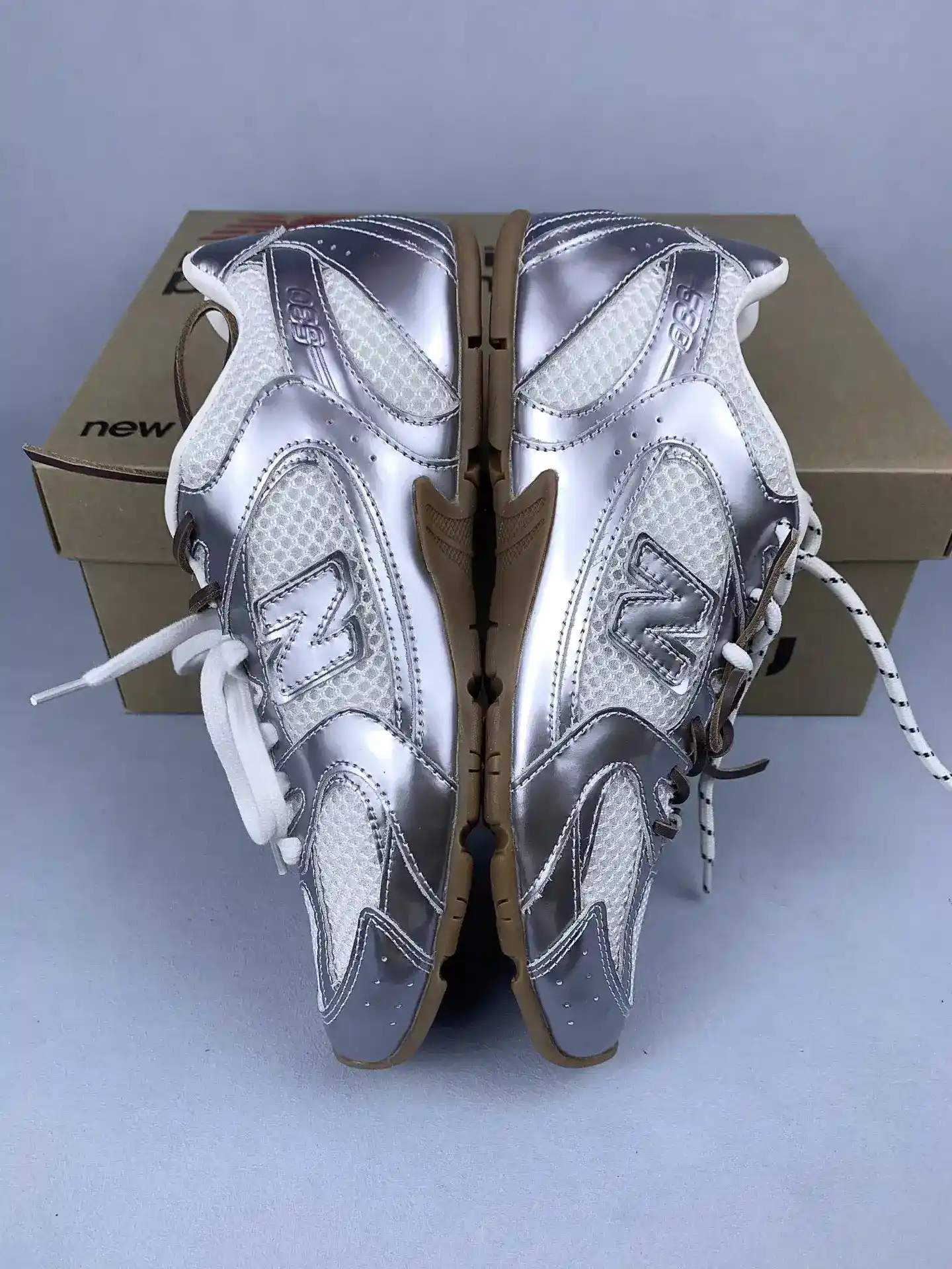 New Balance X Miu Miu 530 SL metallic leather and mesh sneakers product photo from LabelPicks