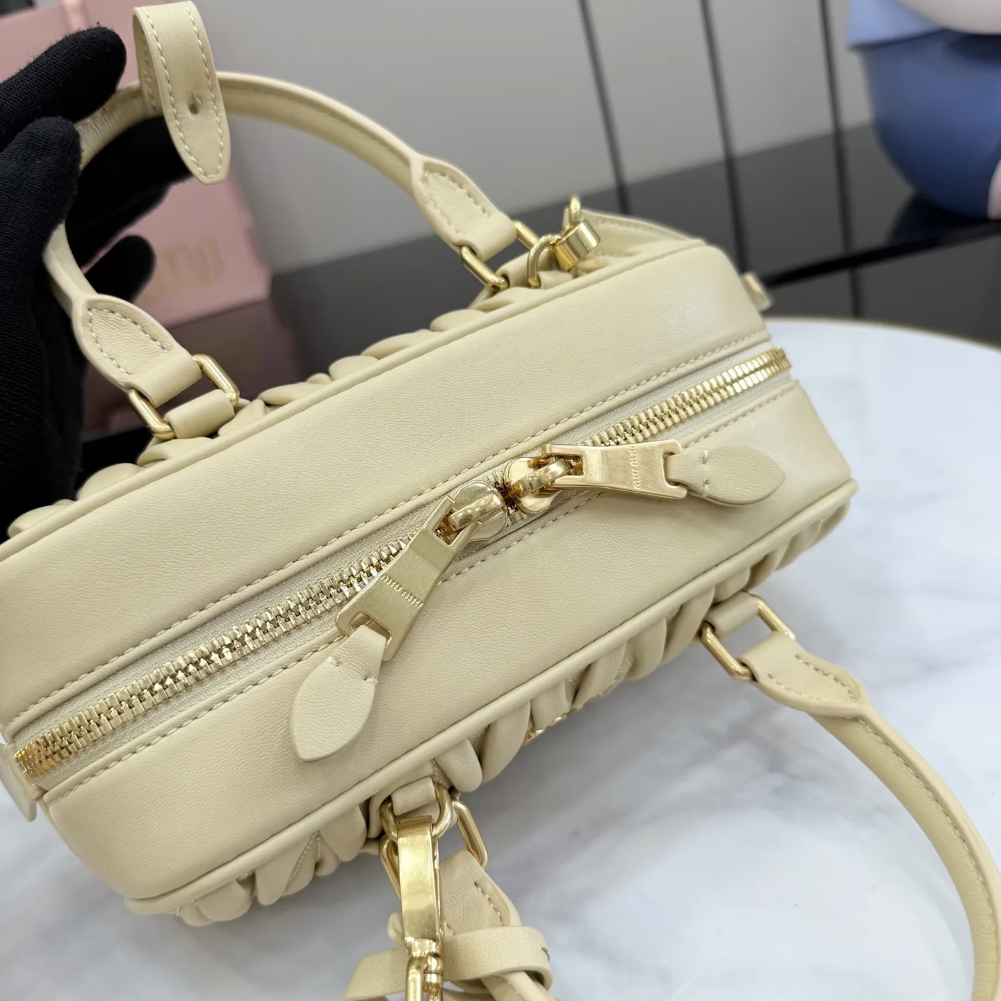 Miu Miu Lambskin Matelasse Top Handle Bag product photo from LabelPicks
