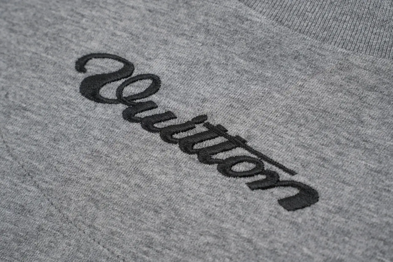 Louis Vuitton Grey Badge Print T-Shirt product photo from LabelPicks