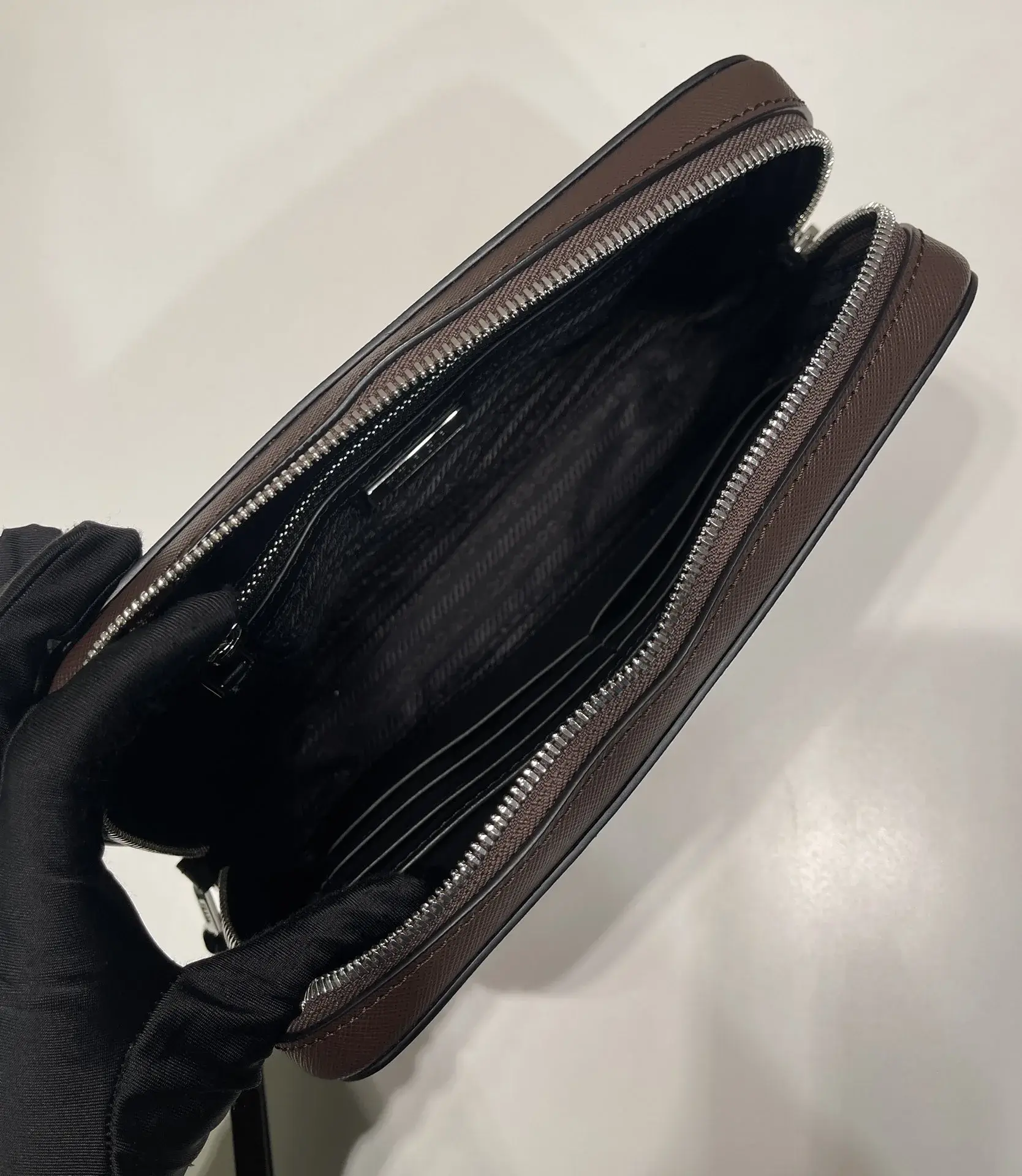Prada Grained Leather Clutch product photo from LabelPicks