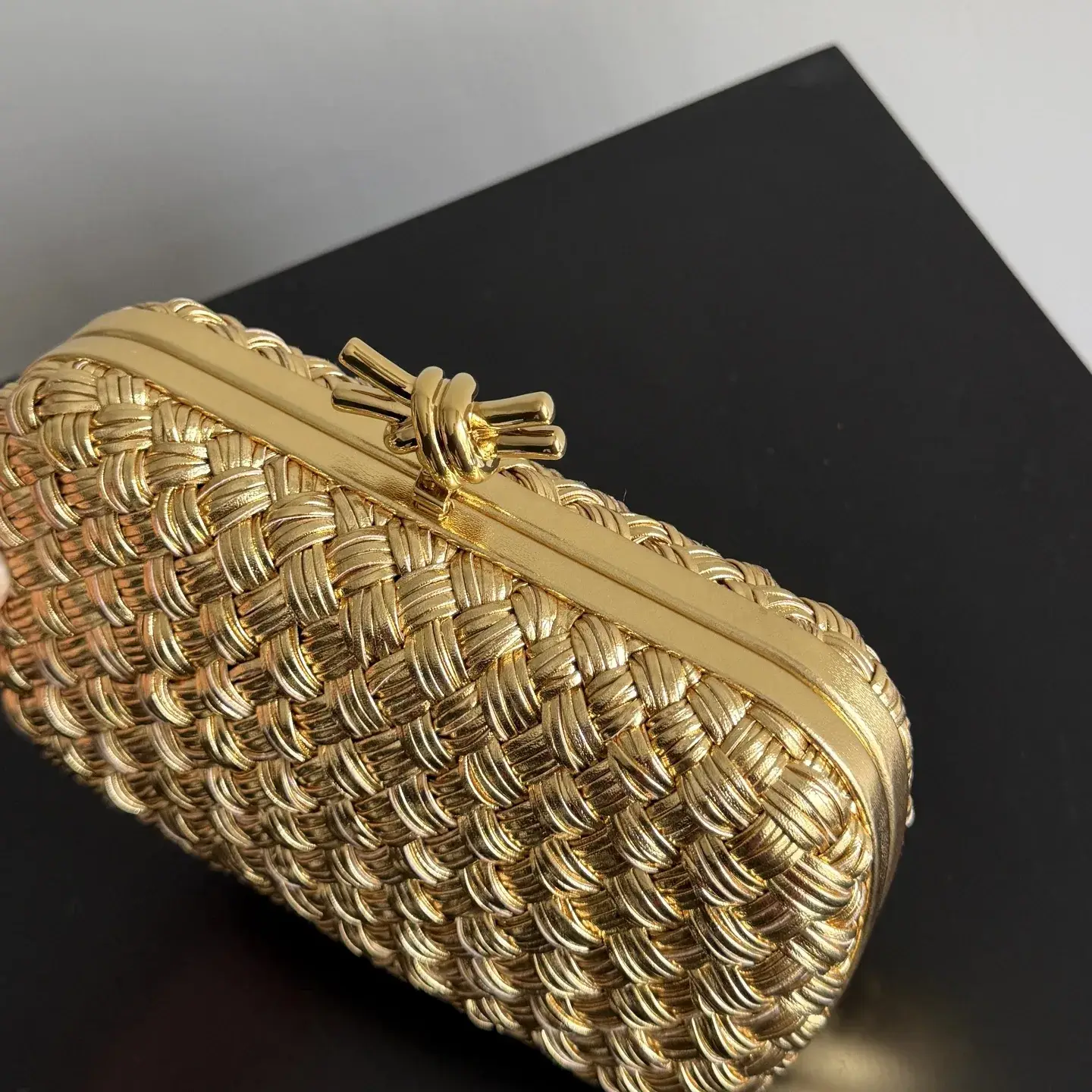 Bottega Veneta Intrecciato Woven Leather Knot Clutch product photo from LabelPicks