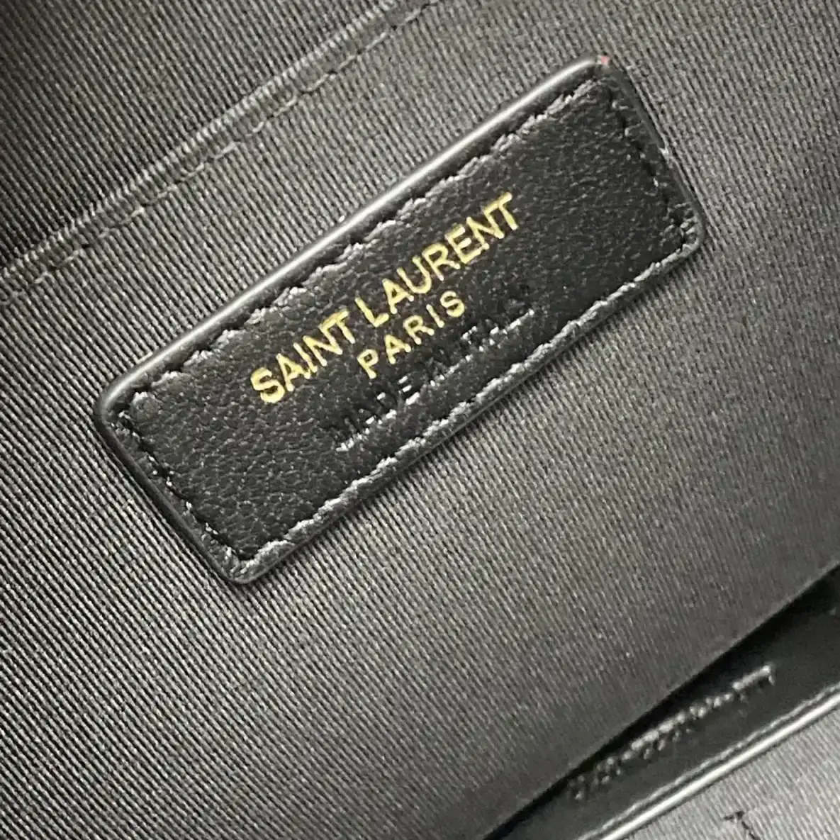 Saint Laurent Quilted Leather Clutch product photo from LabelPicks