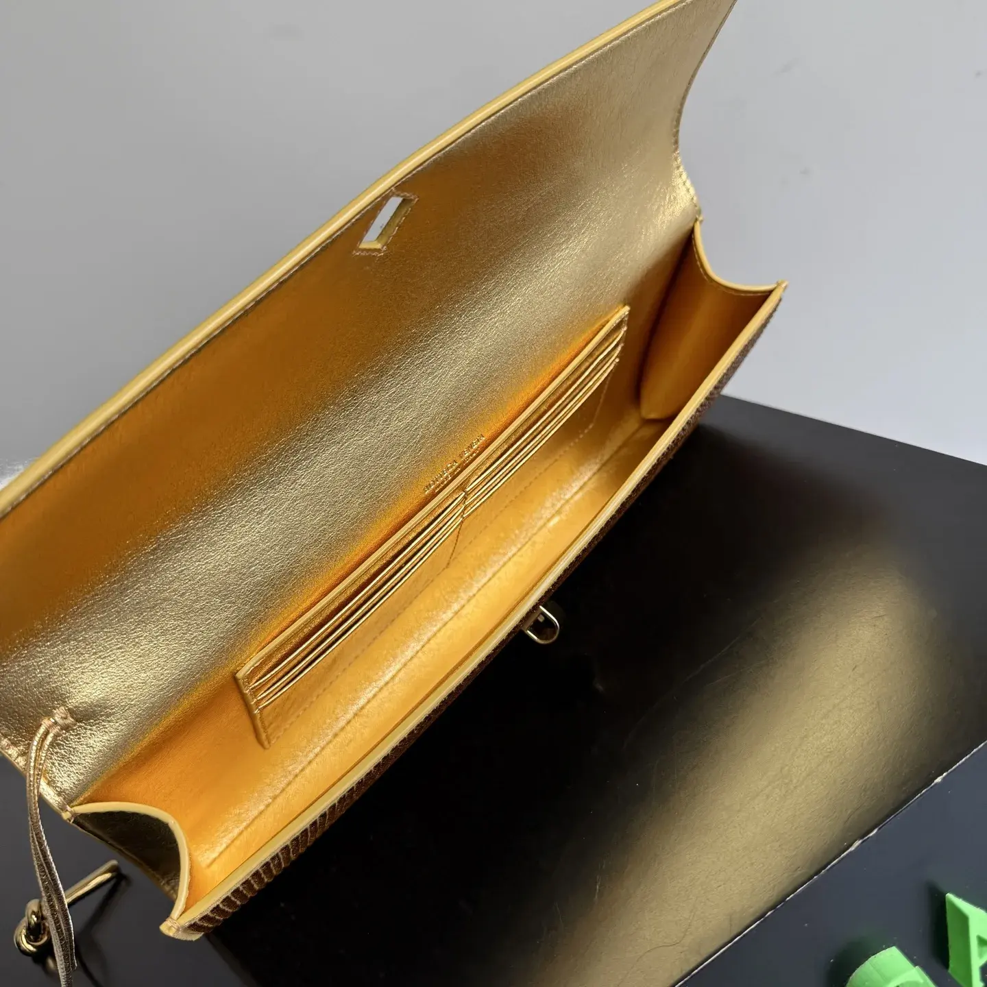 Bottega Veneta Andiamo Lambskin Clutch product photo from LabelPicks