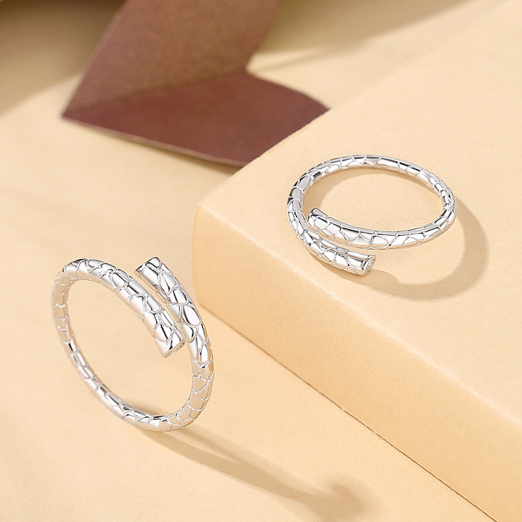 925 sterling silver couple rings, featuring a unique design with a circular geometric snake pattern, and an adjustable open ring style