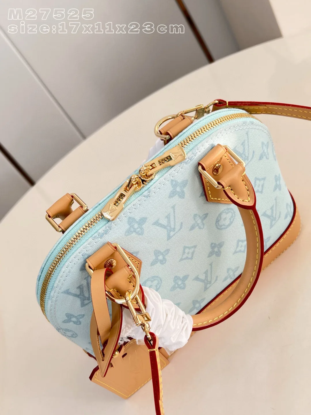 Louis Vuitton Canvas and Leather Alma Top Handle Bag product photo from LabelPicks