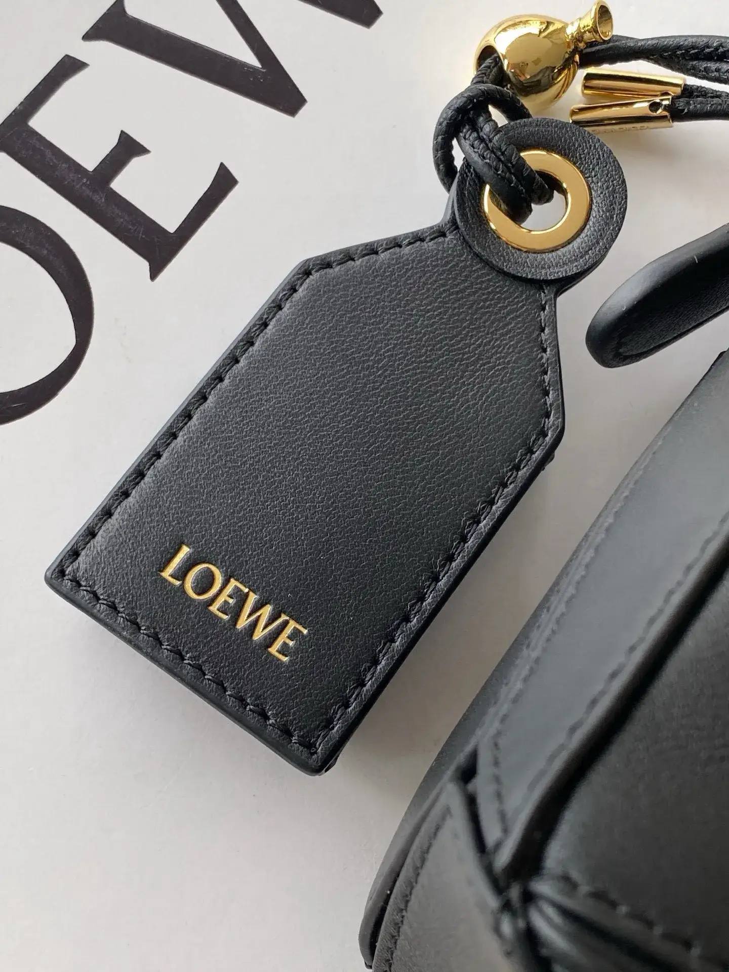 Loewe Puzzle Black Lambskin Top Handle Bag product photo from LabelPicks