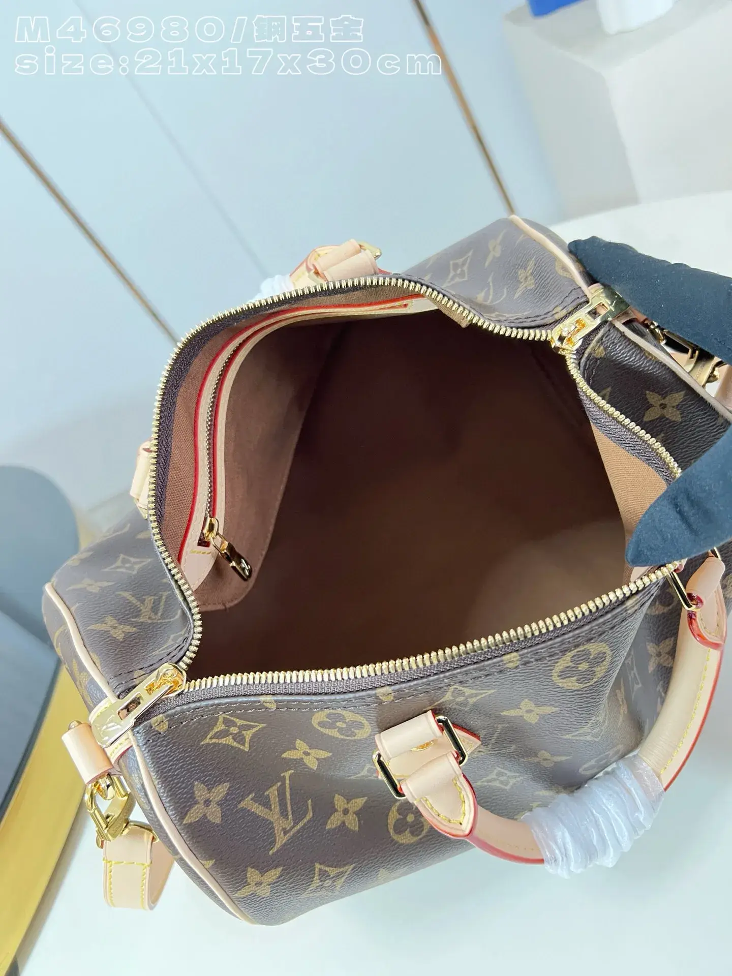Louis Vuitton Canvas and Leather Speedy Top Handle Bag product photo from LabelPicks
