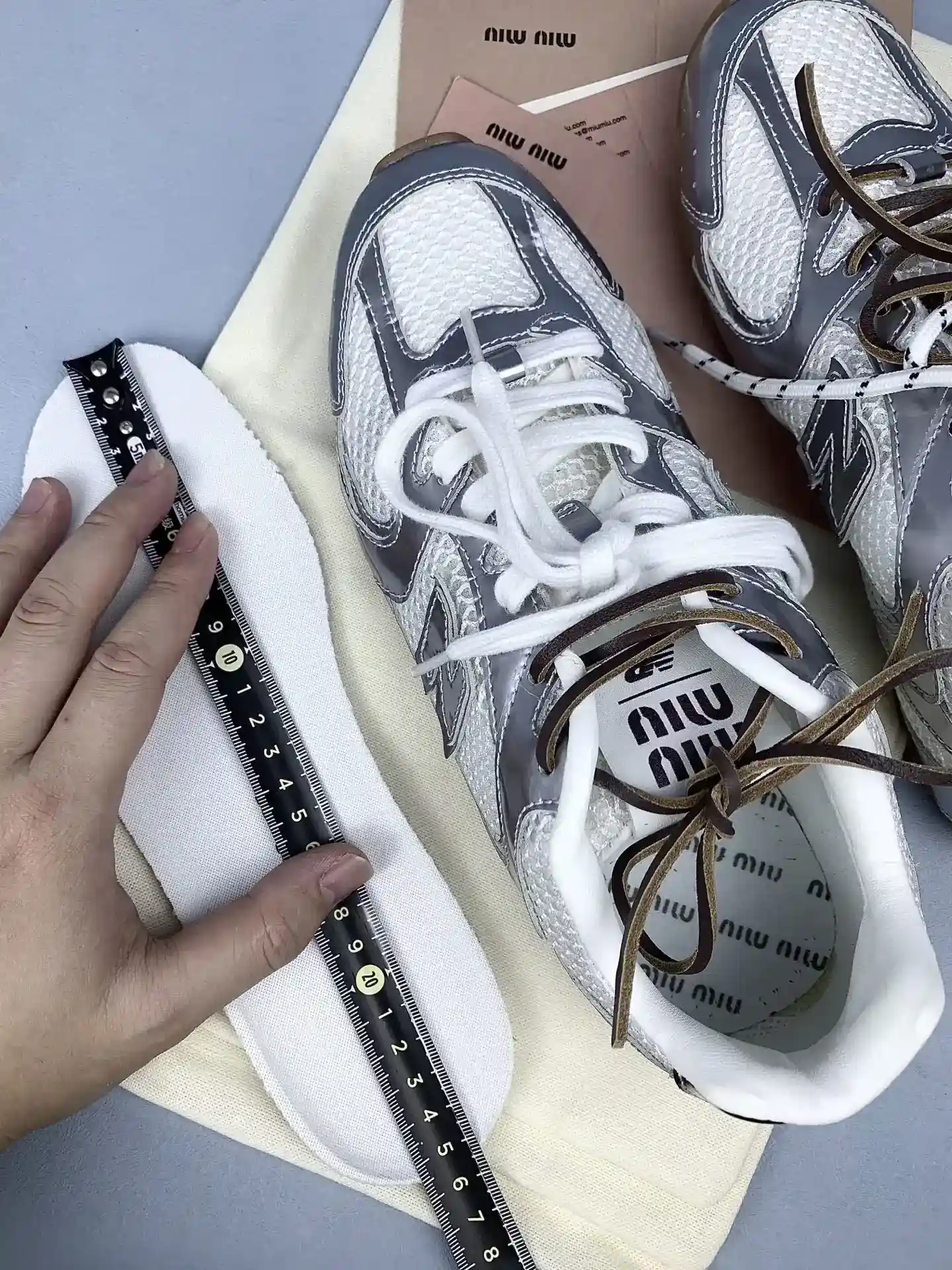 New Balance X Miu Miu 530 SL metallic leather and mesh sneakers product photo from LabelPicks