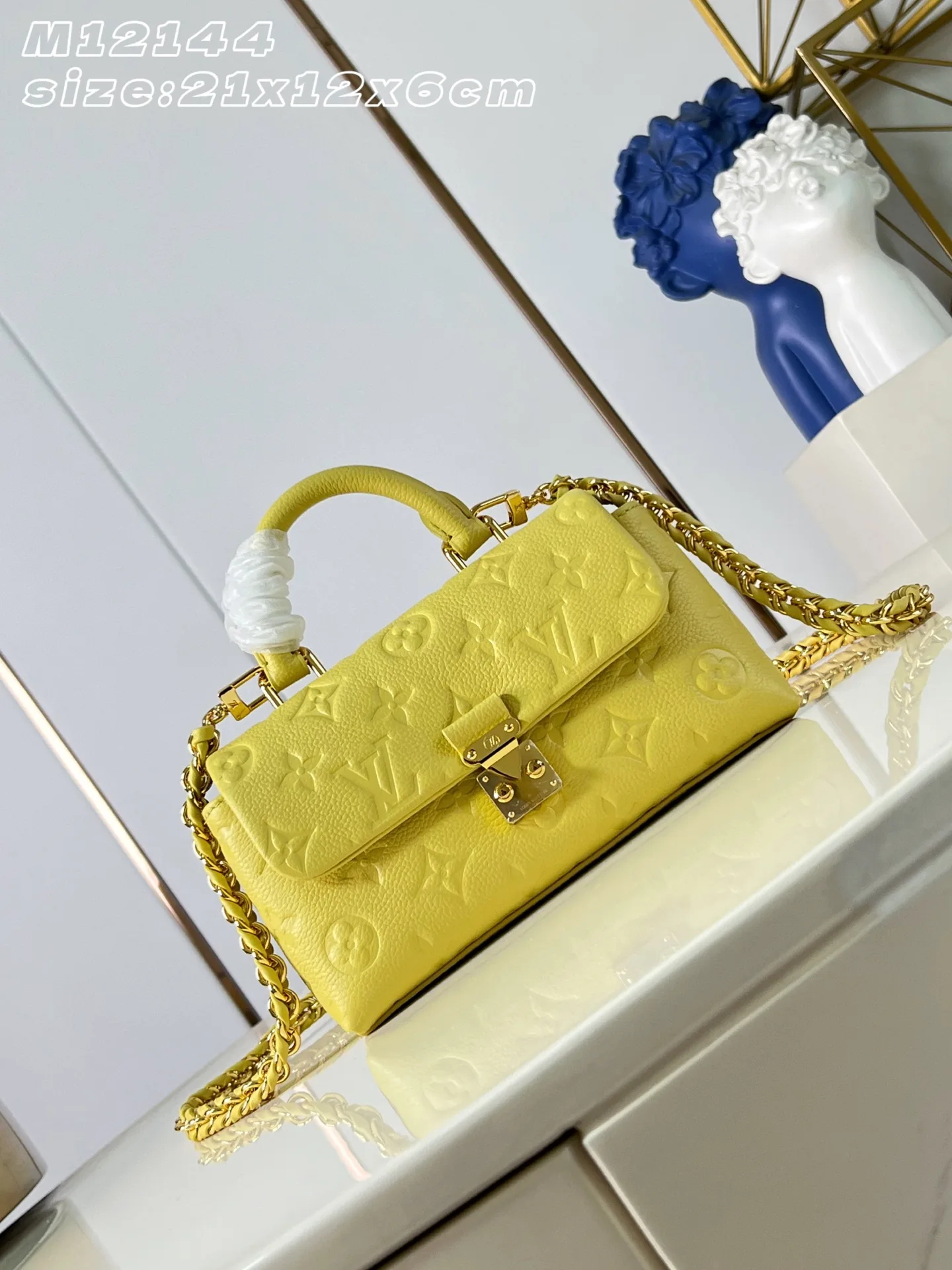 Louis Vuitton Woven Leather Madeleine Top Handle Bag product photo from LabelPicks