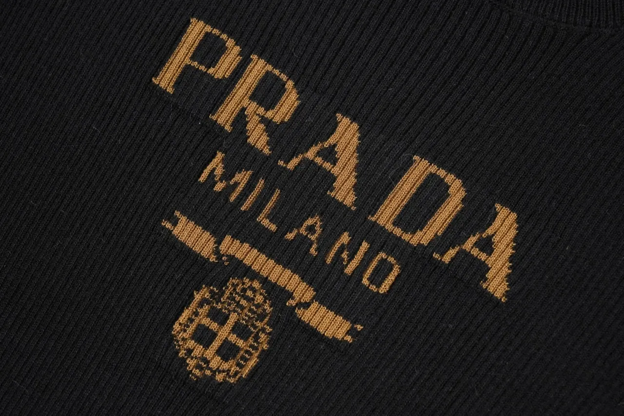 Prada Black Gold Logo Embroidered Half-Sleeve Knit Top product photo from LabelPicks