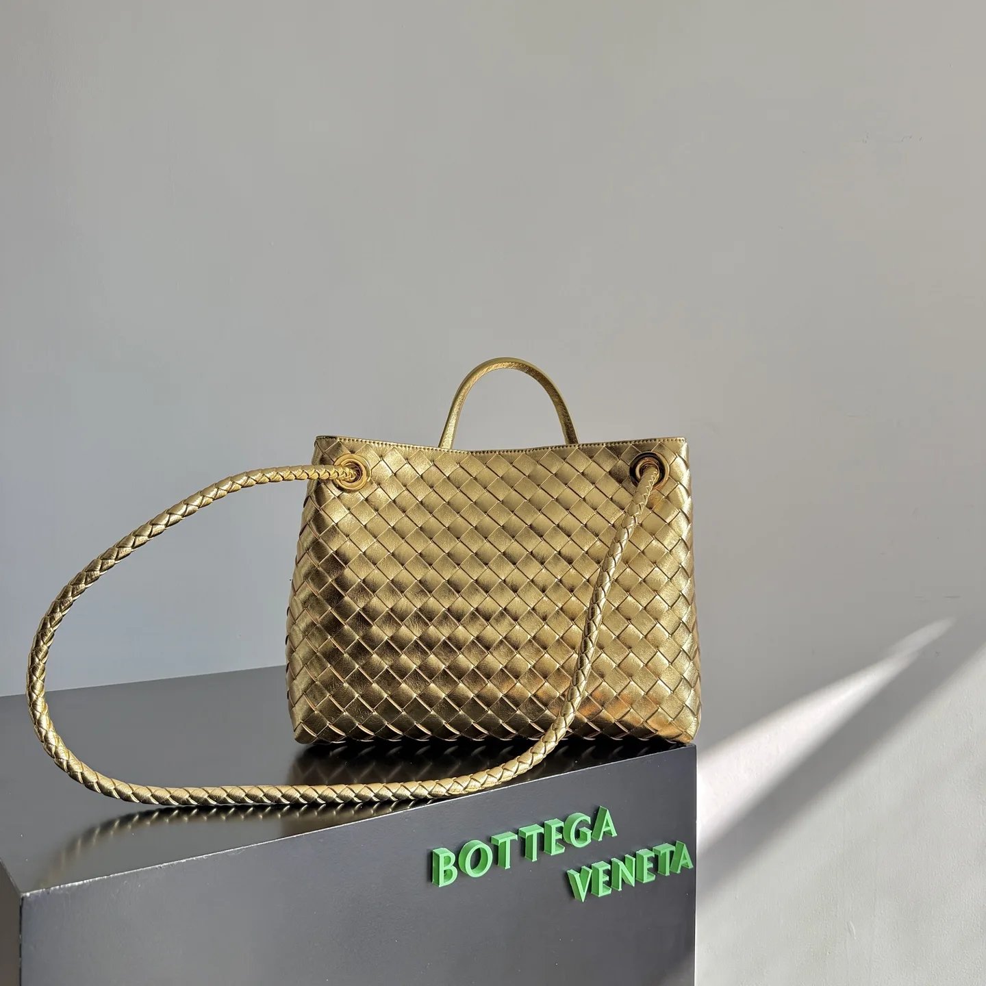 Bottega Veneta Gold Andiamo Intrecciato Woven Leather Top Handle Bag product photo from LabelPicks