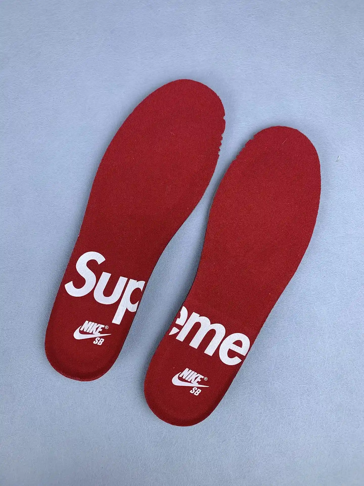 Supreme x Nike SB Dunk Low OG QS Shoes product photo from LabelPicks