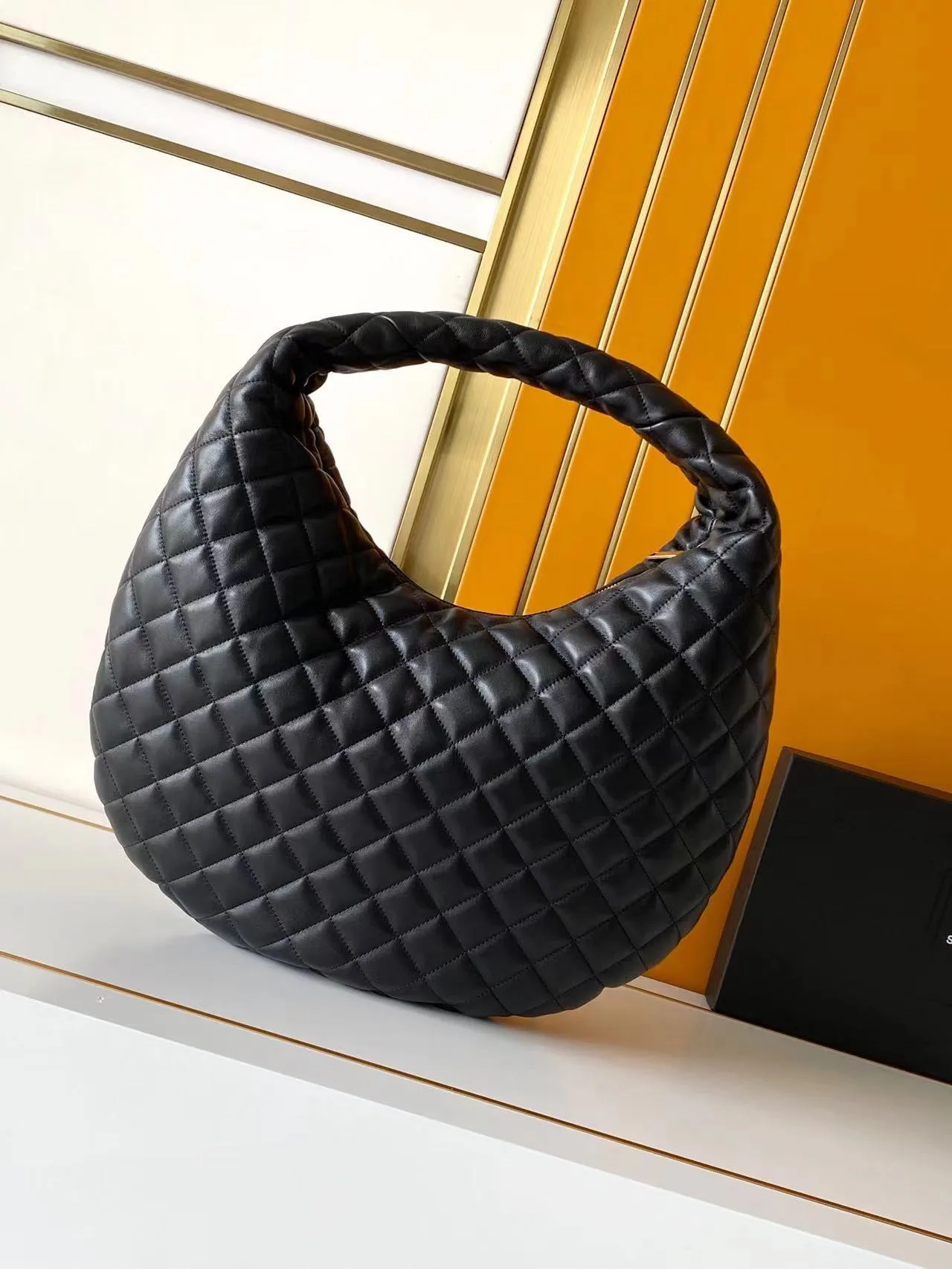 Saint Laurent Lambskin Icare Hobo Bag product photo from LabelPicks