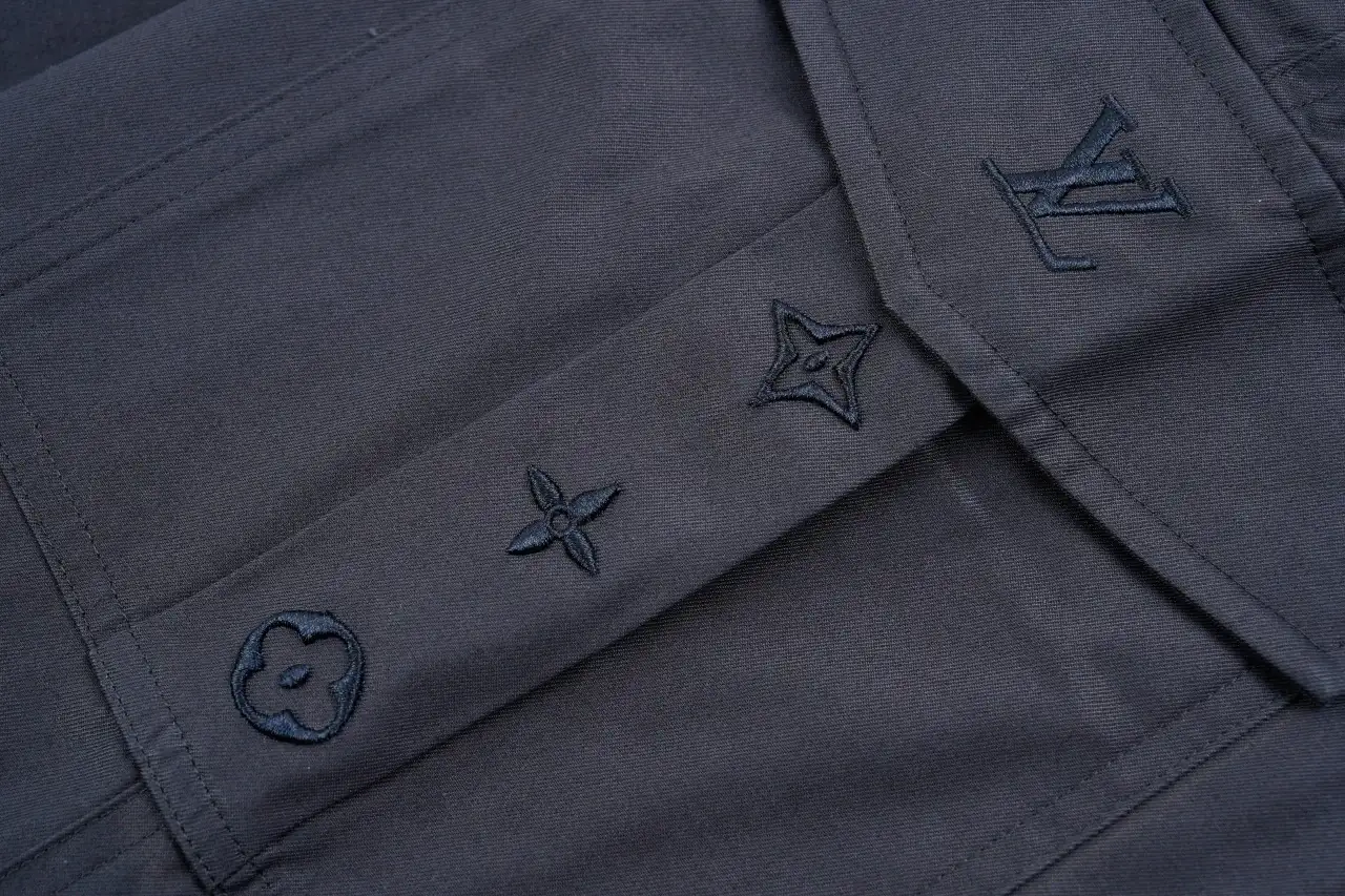 Louis Vuitton Navy Multi Pocket Embroidered Cargo Pants product photo from LabelPicks