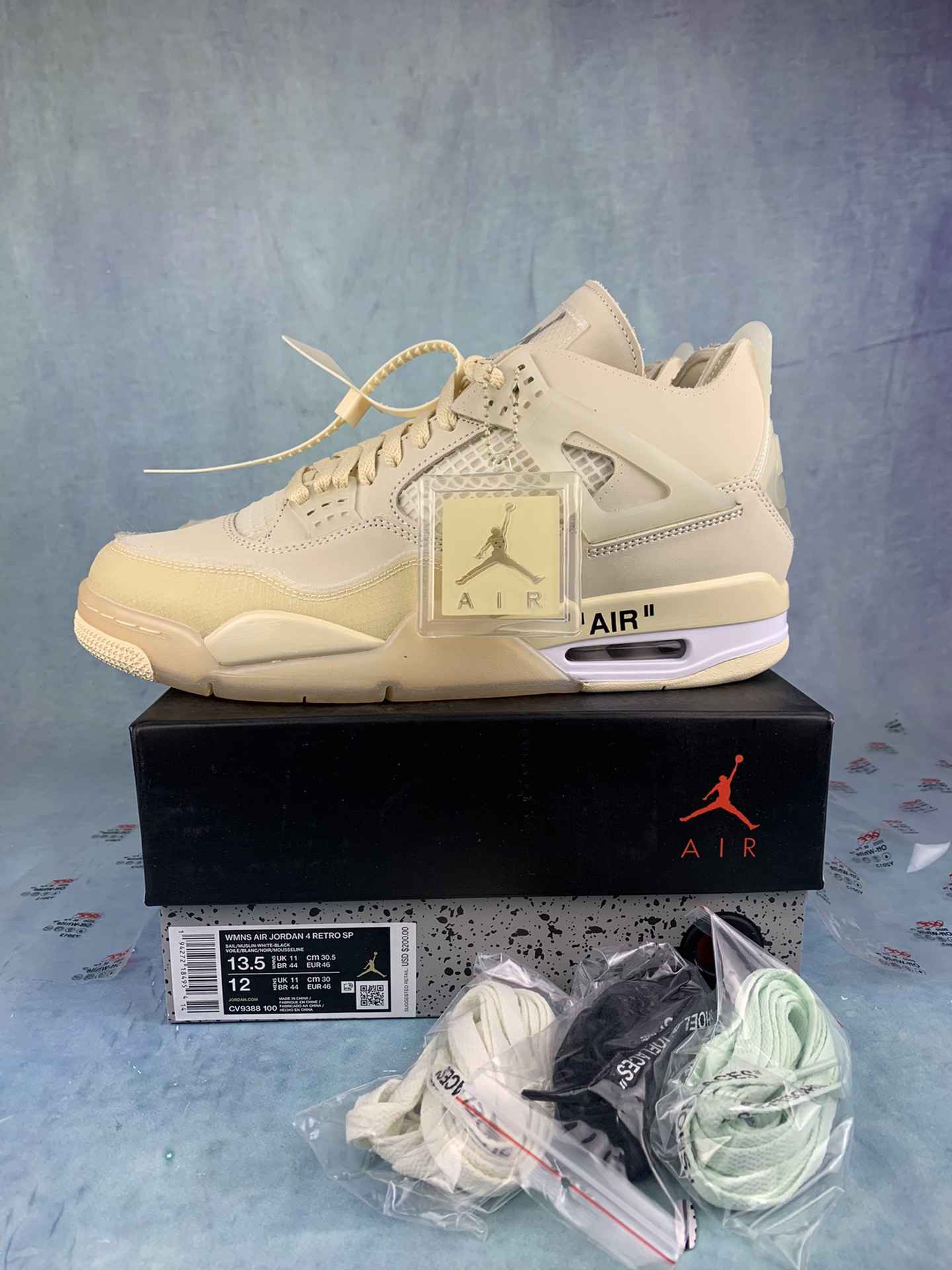 Off-White x Air Jordan 4 “Sail” Shoes