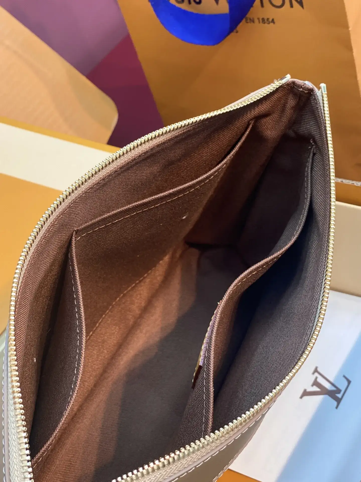 Louis Vuitton Red Pochette Canvas and Leather Clutch product photo from LabelPicks