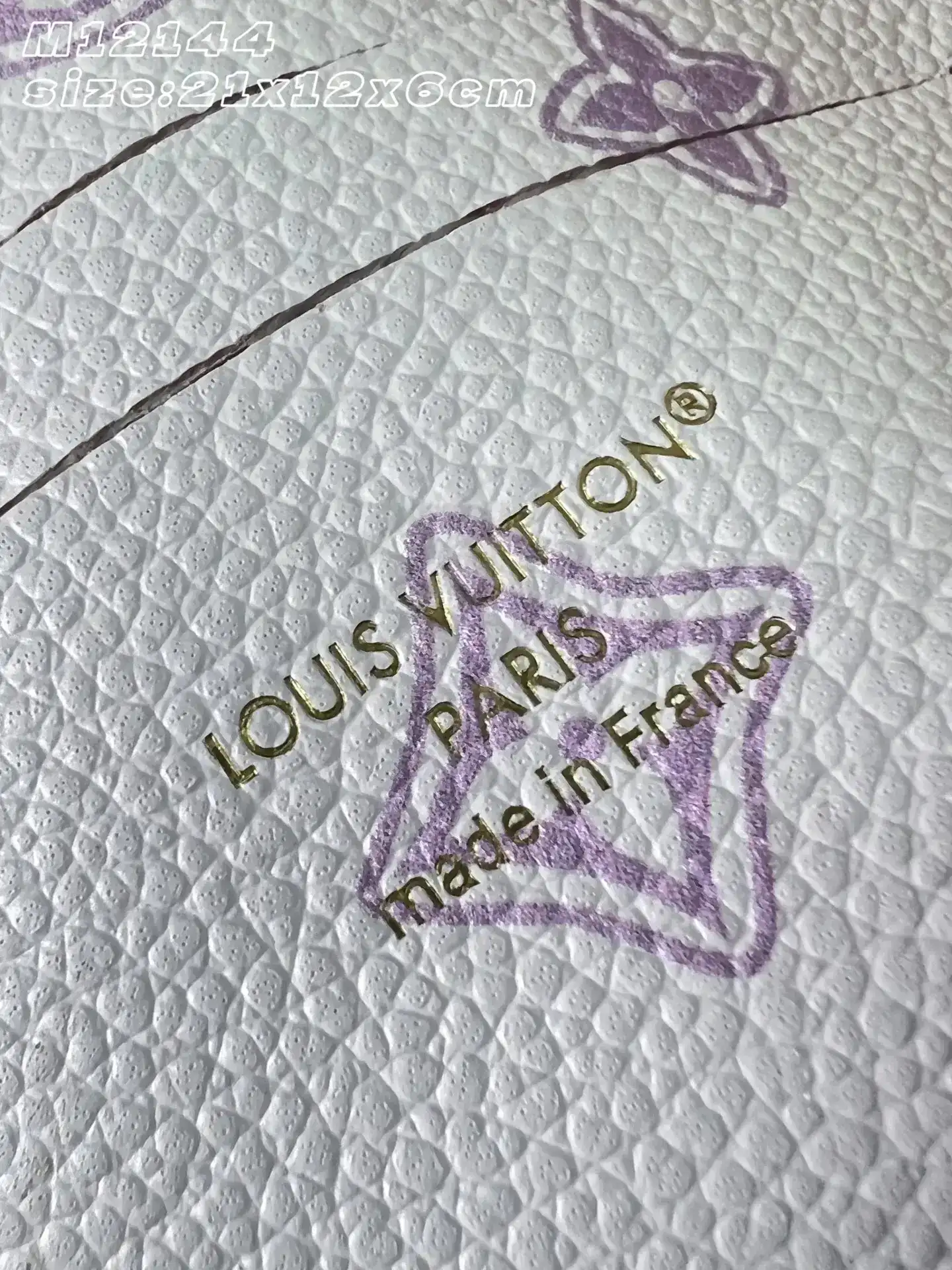 Louis Vuitton Woven Leather Madeleine Top Handle Bag product photo from LabelPicks