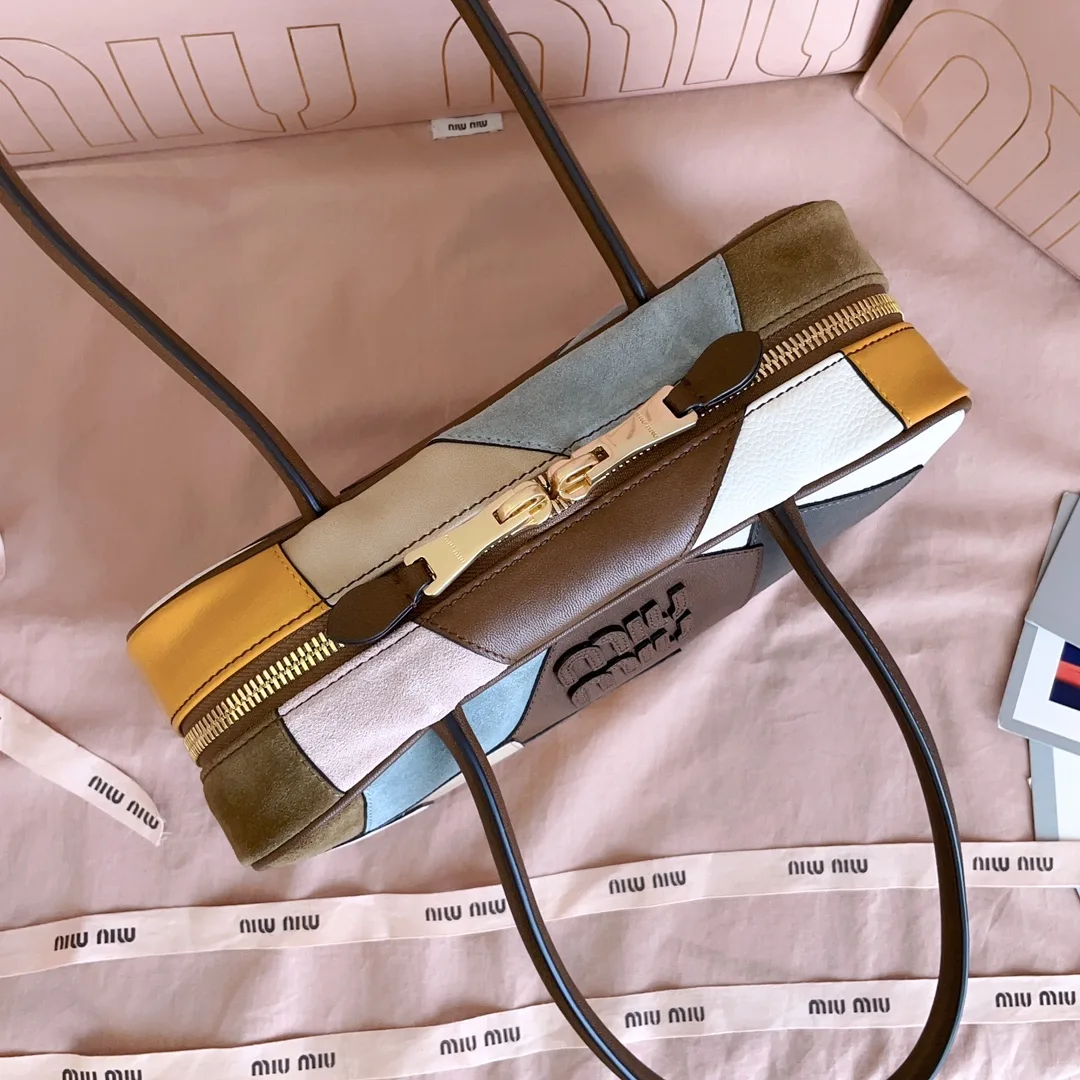 Miu Miu Canvas and Leather Top Handle Bag product photo from LabelPicks