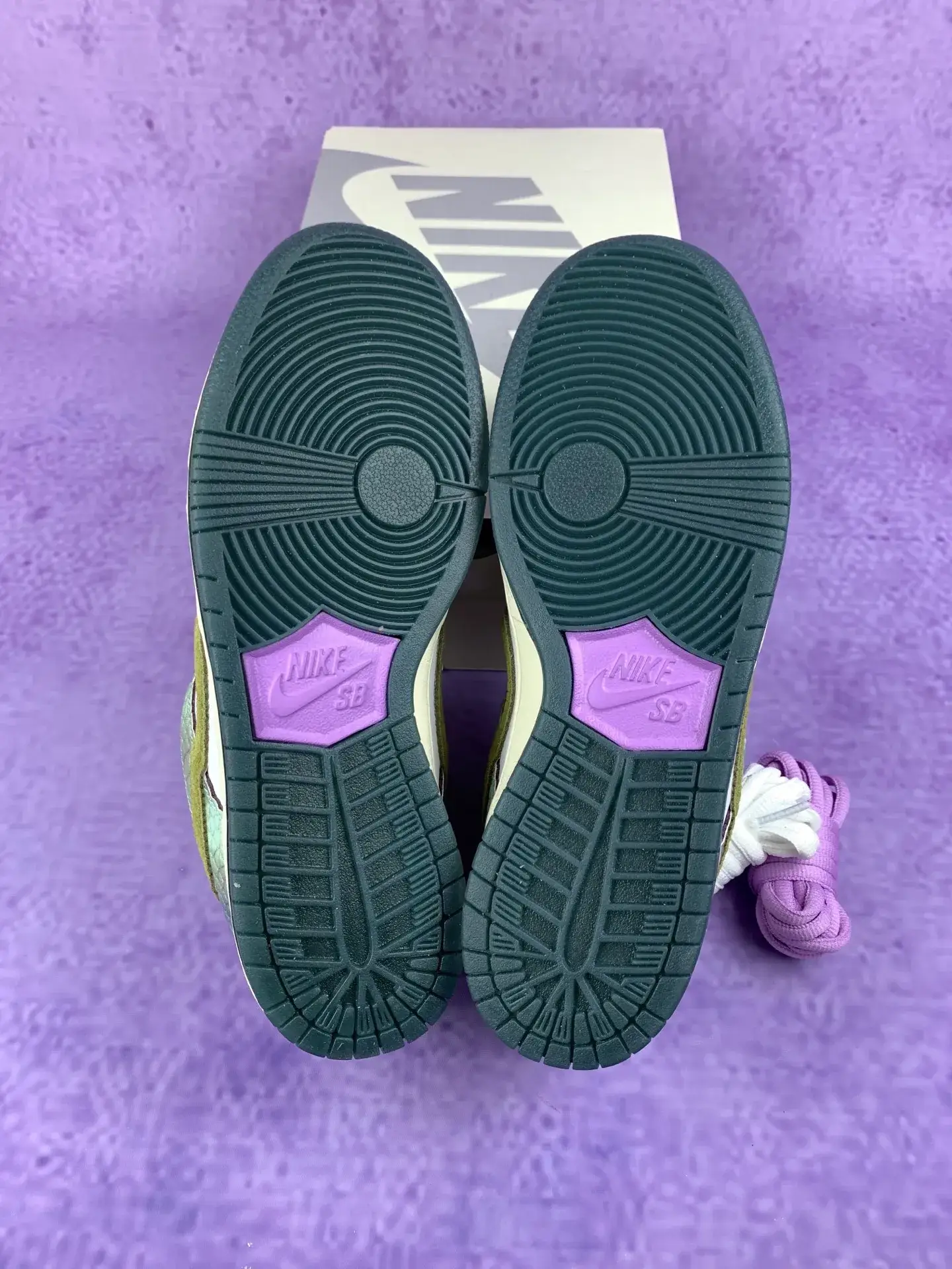 Alexis Sablone x Nike SB Dunk Low Pro “Chameleon” - Oil Green/Desert Moss/White product photo from LabelPicks
