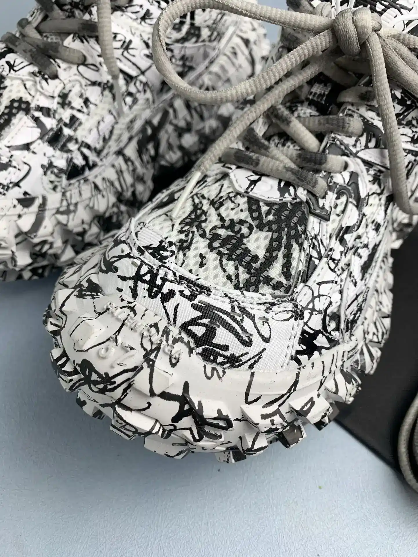 6XL Sneaker in Black/White Allover Print product photo from LabelPicks