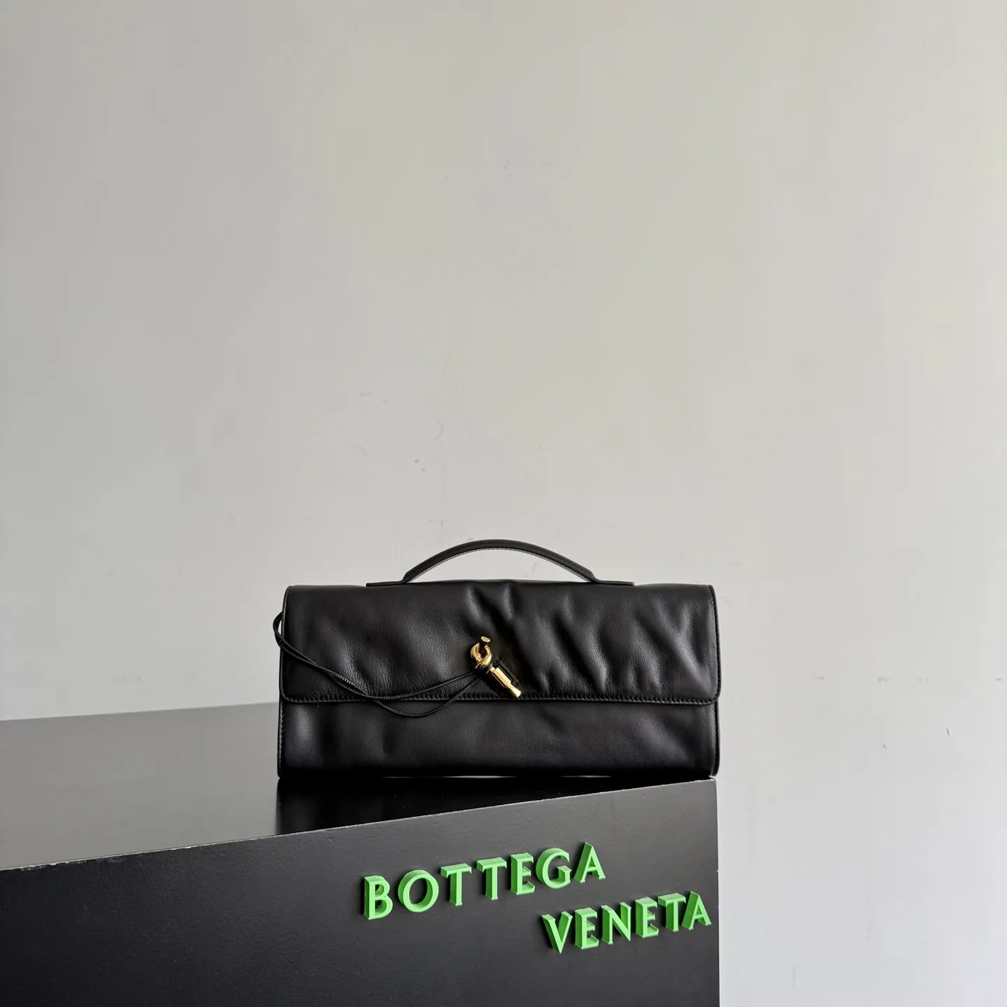 Bottega Veneta Andiamo Intrecciato Woven Leather Clutch product photo from LabelPicks
