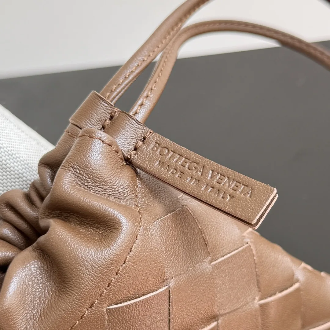 Bottega Veneta Intrecciato Woven Leather Clutch product photo from LabelPicks