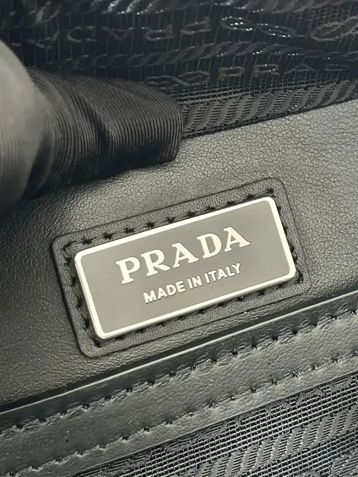 Prada Grained Leather Clutch product photo from LabelPicks
