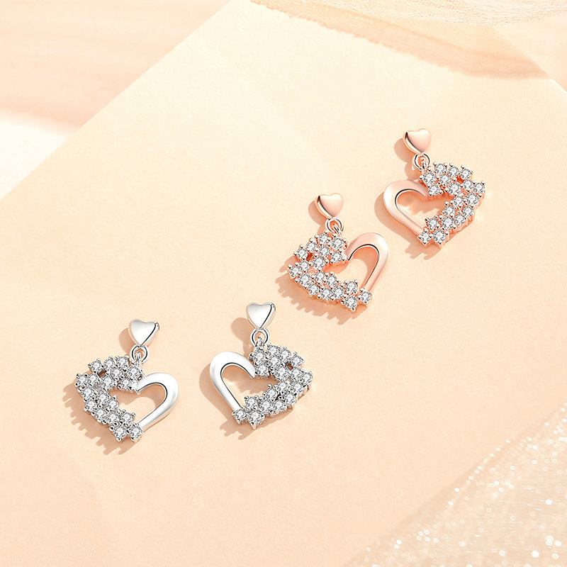 Sparkling heart-shaped earrings for women, made of pure silver, fashionable and versatile, with a delicate and elegant design, featuring cubic zirconia stones