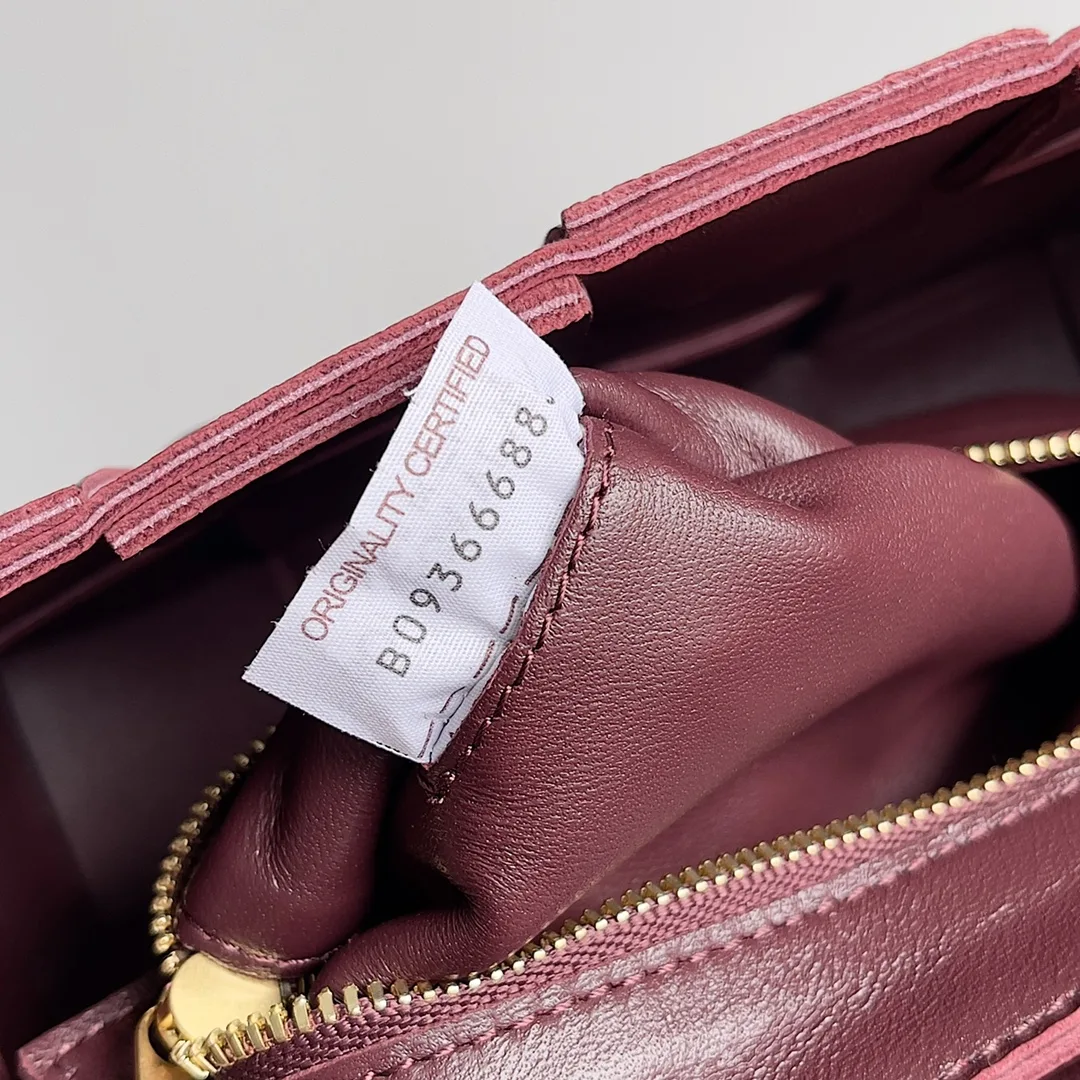 Bottega Veneta Cassette Burgundy Intrecciato Woven Leather Shoulder Bag product photo from LabelPicks