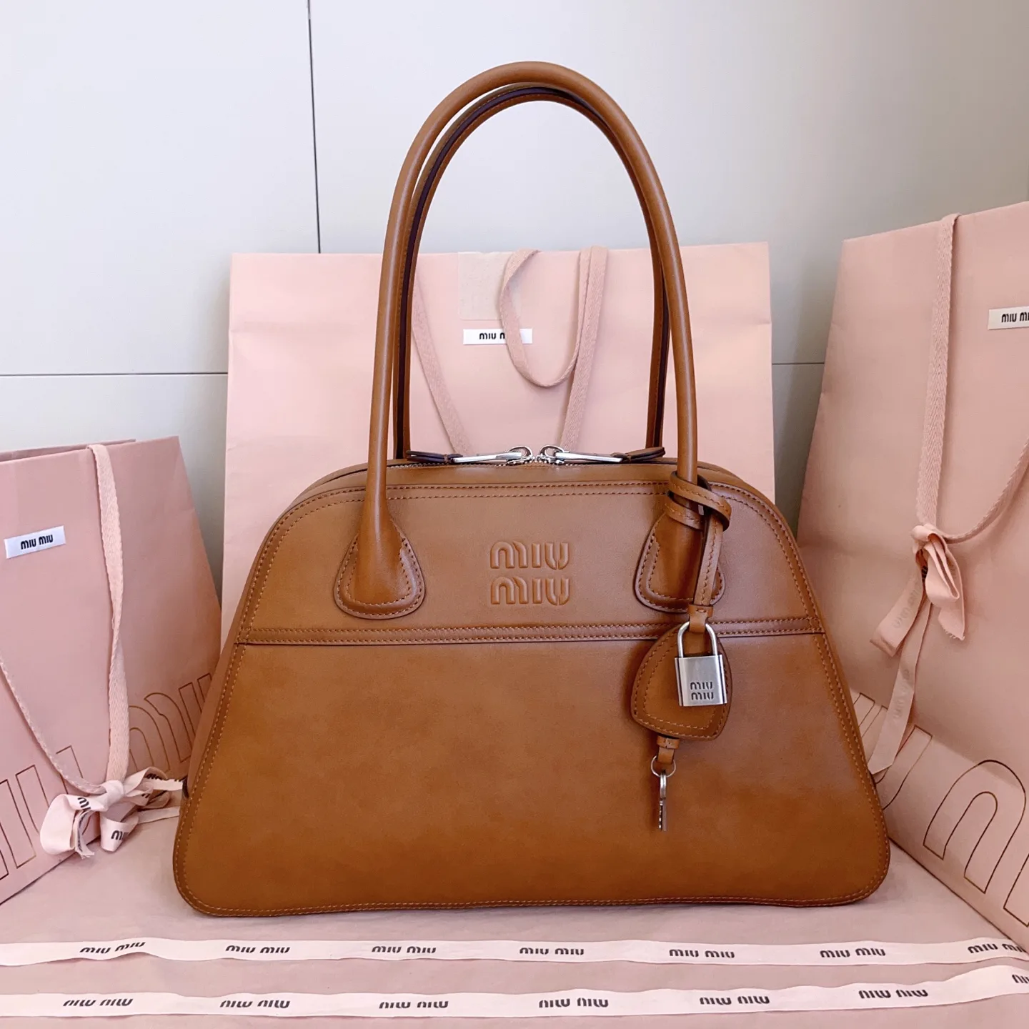 Miu Miu Lambskin Vivant Top Handle Bag product photo from LabelPicks