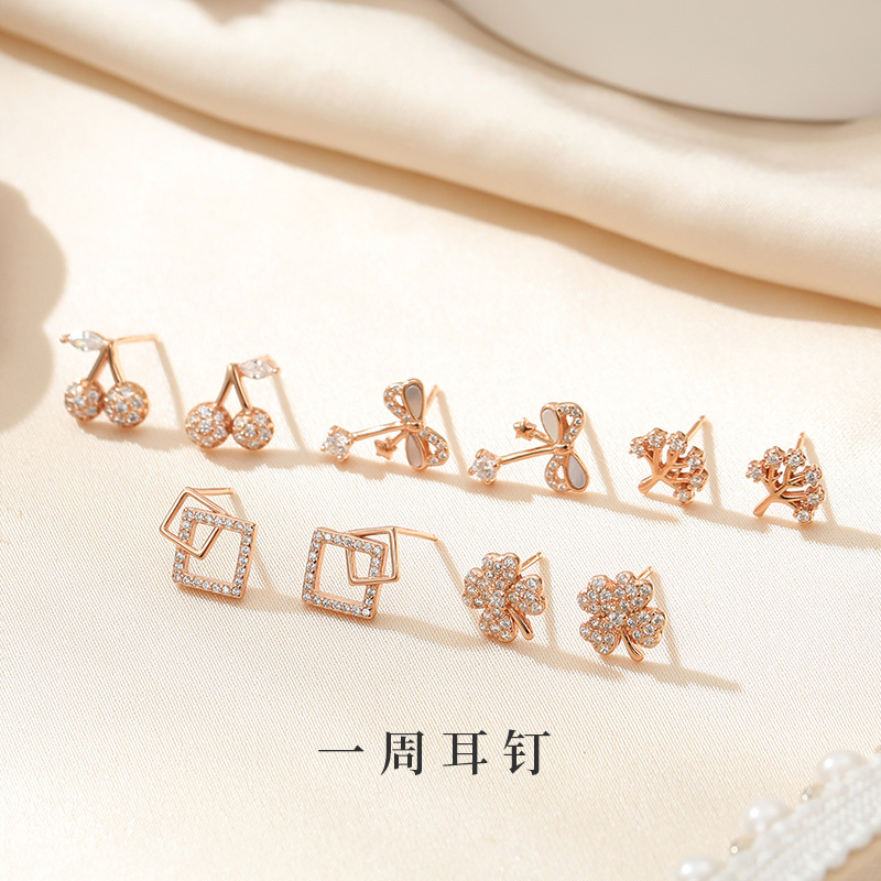 S925 sterling silver, everyday commuter earrings for women, Korean style, minimalist geometric design with a bow and four-leaf clover, perfect for Instagram