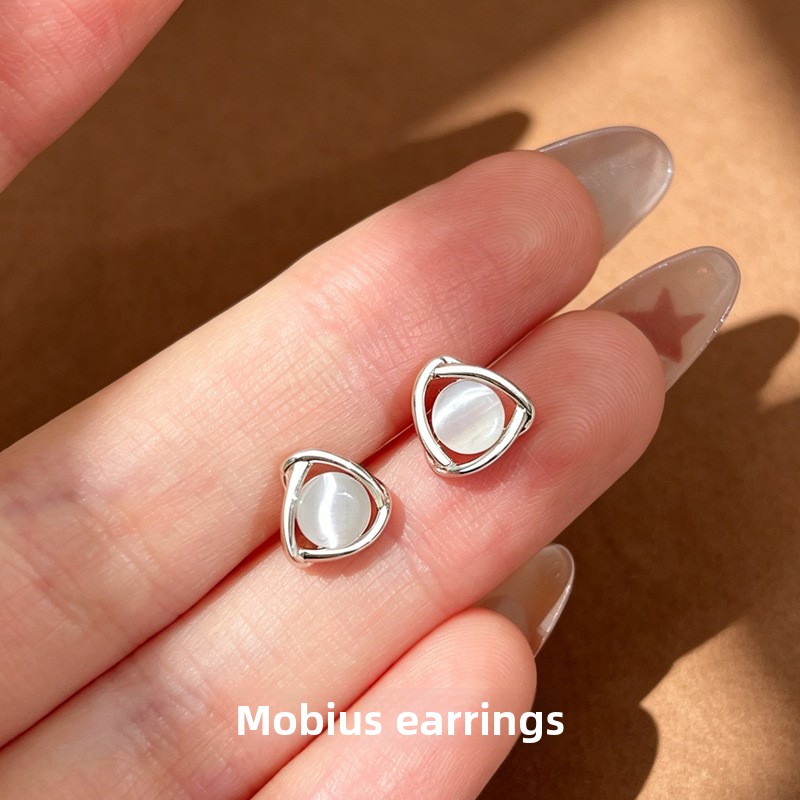 999 pure silver triangular cat-eye earrings for women, niche light luxury with a high-end feel, Mobius earrings for commuting
