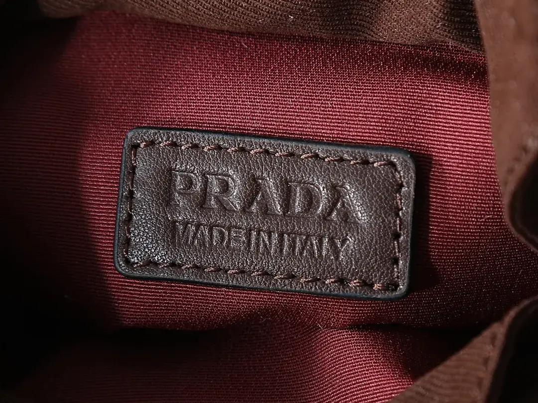 Prada Burgundy Woven Leather Bucket Bag product photo from LabelPicks