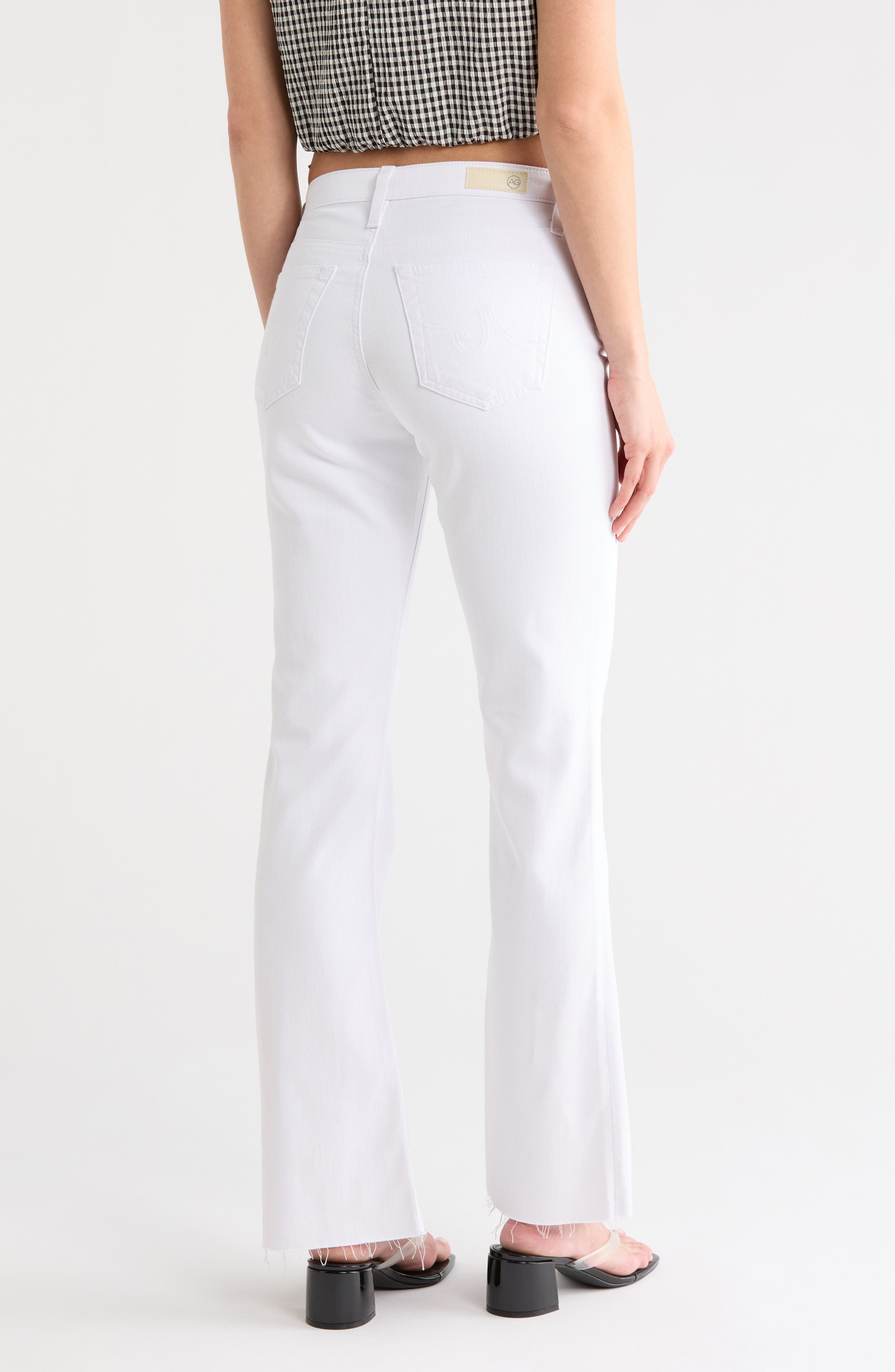AG Angel Raw Hem Mid Rise Bootcut Jeans