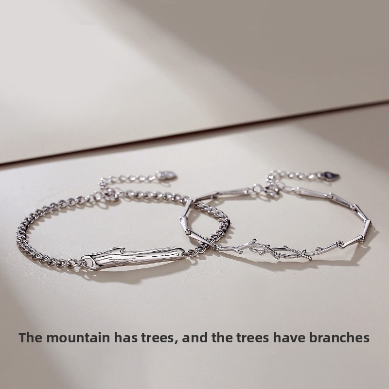 A mountain with trees, trees with branches – a pair of sterling silver couple bracelets featuring a minimalist, forest-inspired design with a unique and original aestheticAvailable for drop shipping