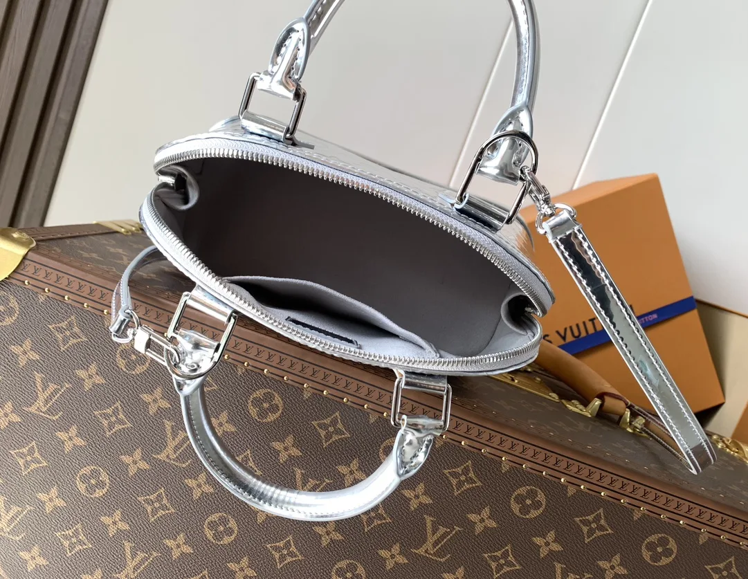 Louis Vuitton Alma Silver Monogram Canvas Top Handle Bag product photo from LabelPicks