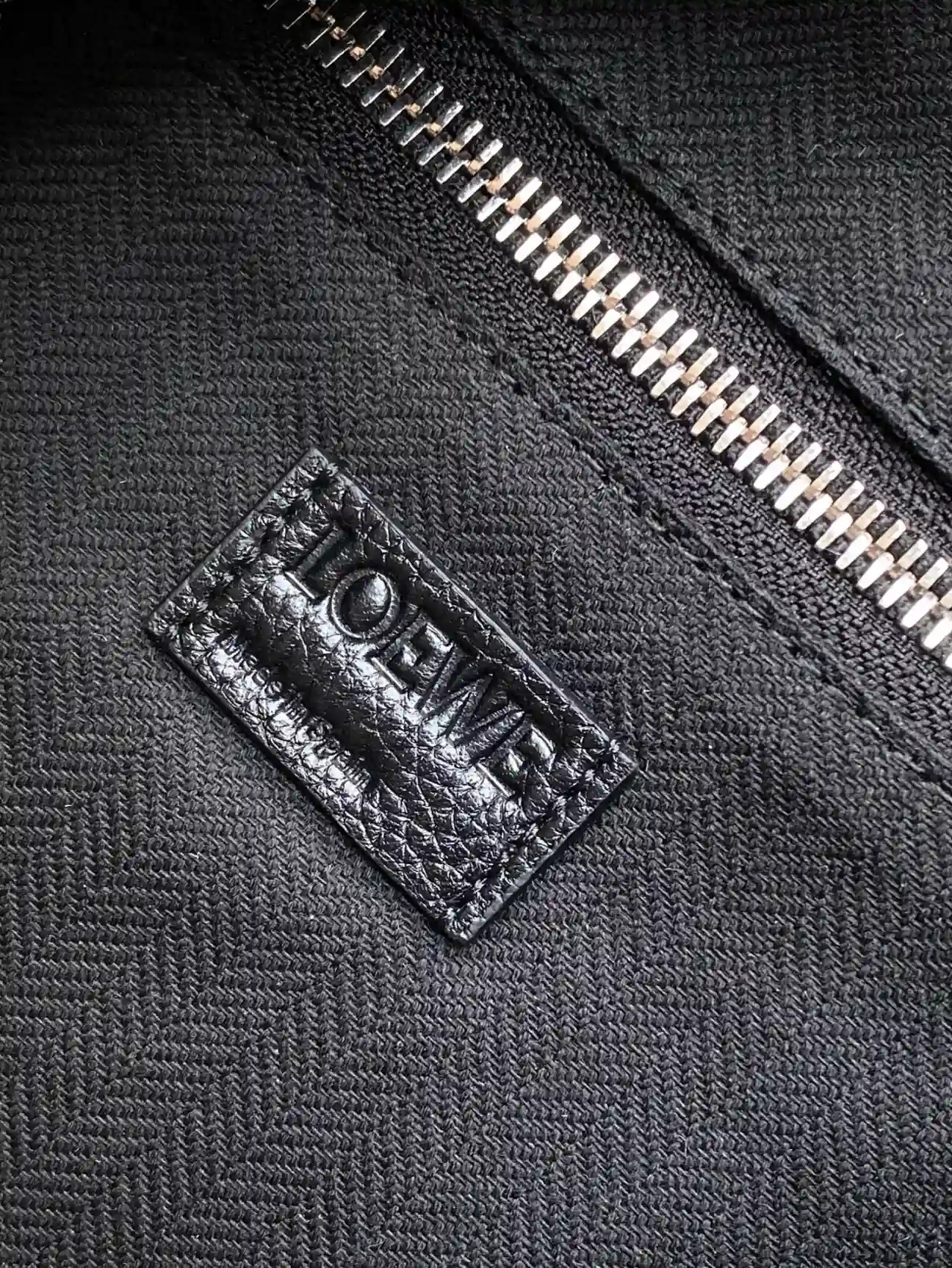 Bottega Veneta Loop Black Grained Leather Bucket Bag product photo from LabelPicks