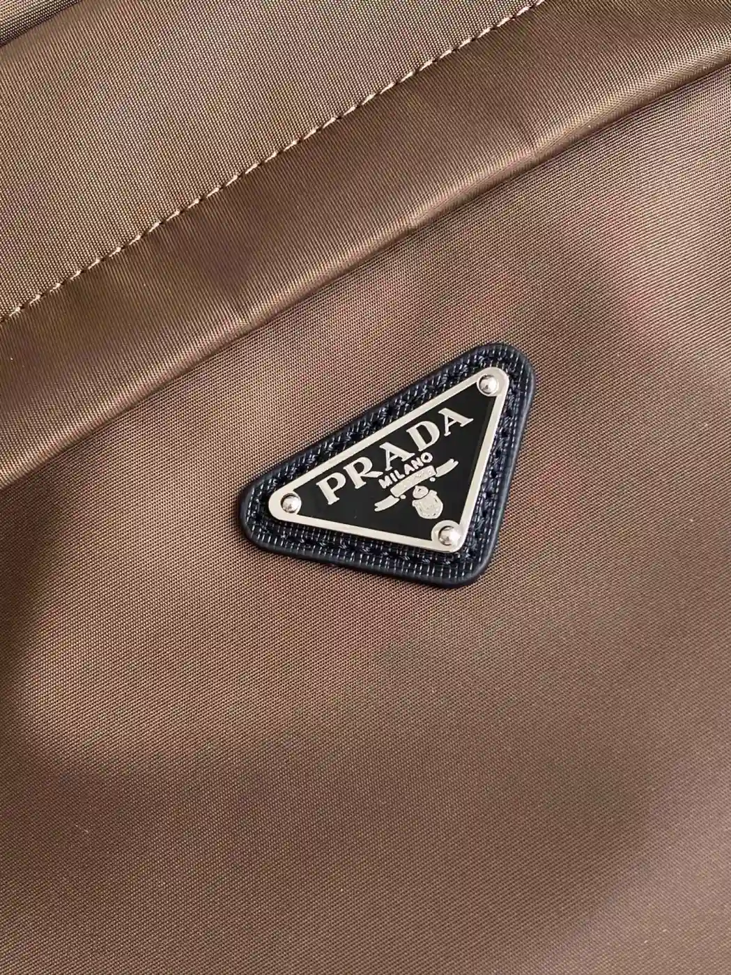 Prada Grained Leather Backpack product photo from LabelPicks
