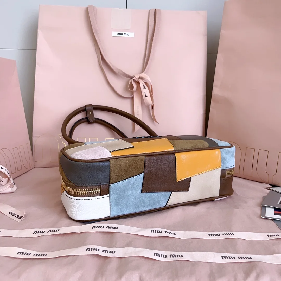 Miu Miu Canvas and Leather Top Handle Bag product photo from LabelPicks