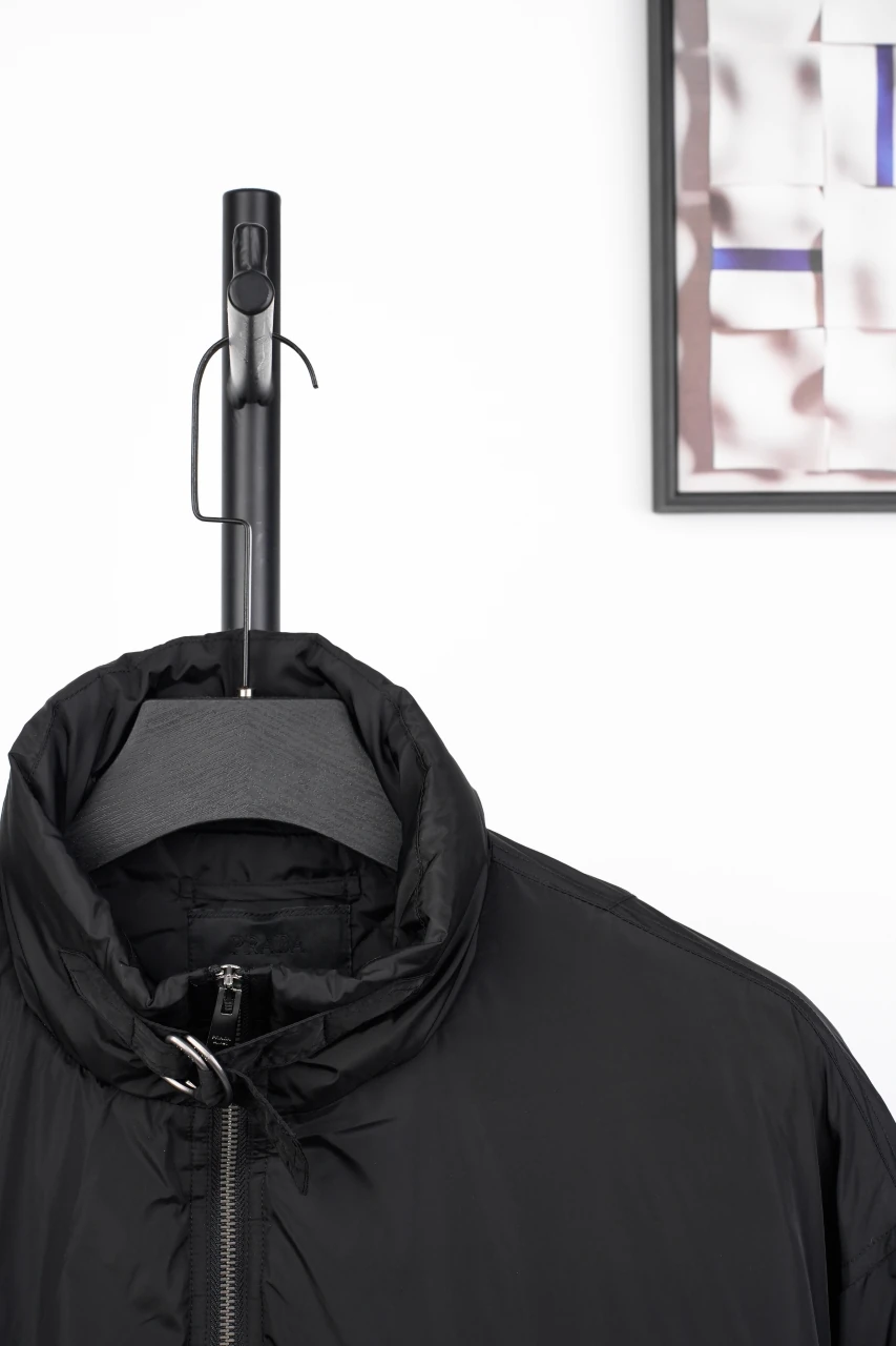 Prada Black Hooded Nylon Down Jacket with Metal Triangle Logo product photo from LabelPicks