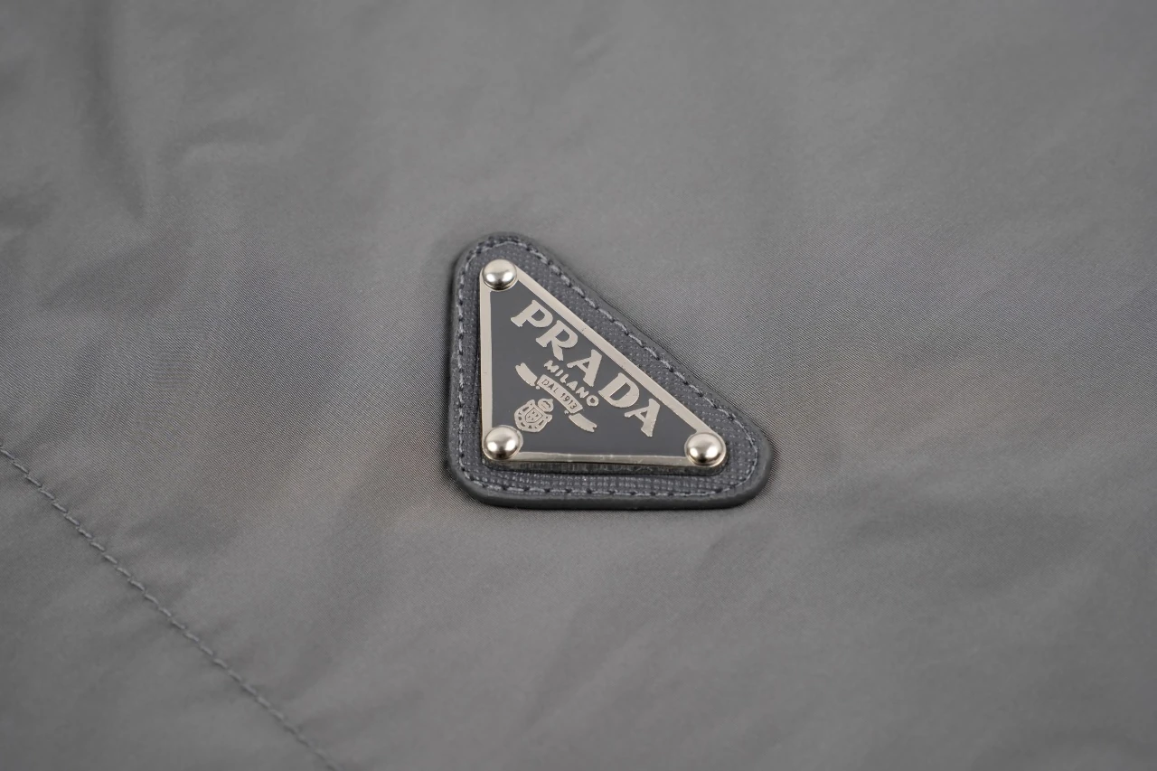 Prada Grey Lightweight Stand-Collar Triangle Logo Jacket product photo from LabelPicks