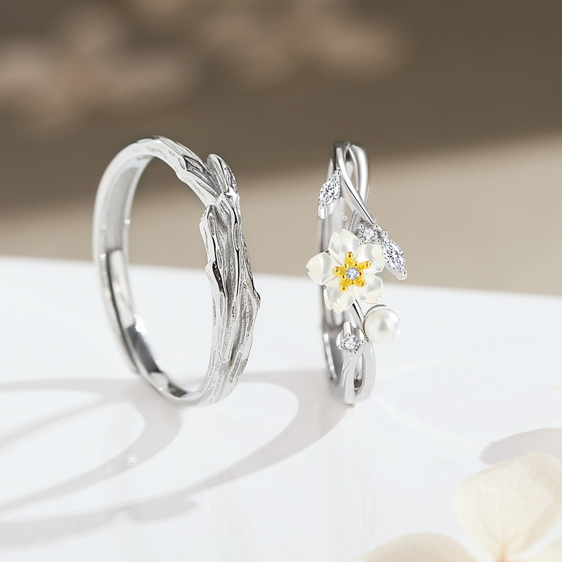 Original design: Camellia-themed couple rings, sterling silver, featuring a delicate, natural aesthetic with mother-of-pearl flower accents, adjustable open ring